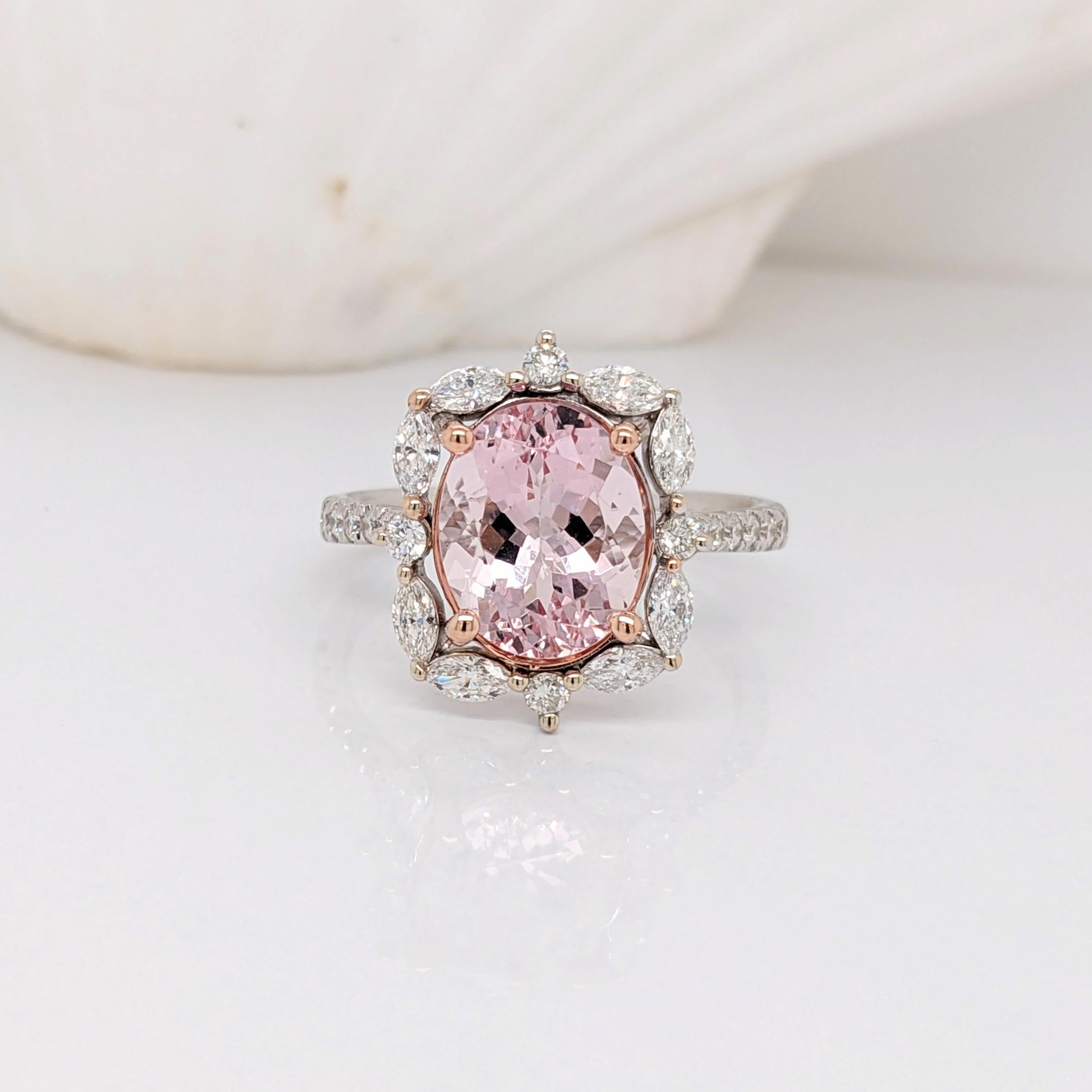 Stone : Pink Morganite
Treatment : Heated
Hardness : 7.5-8
Shape : Round
Cut : Faceted
Size : 2.89cts
Metal : Solid 14k /3.05gms
Diamonds SI GH: 28/0.66cts
Sku: AJR553/4324

This original NNJ Designs ring showcases a feminine pink morganite cut in a