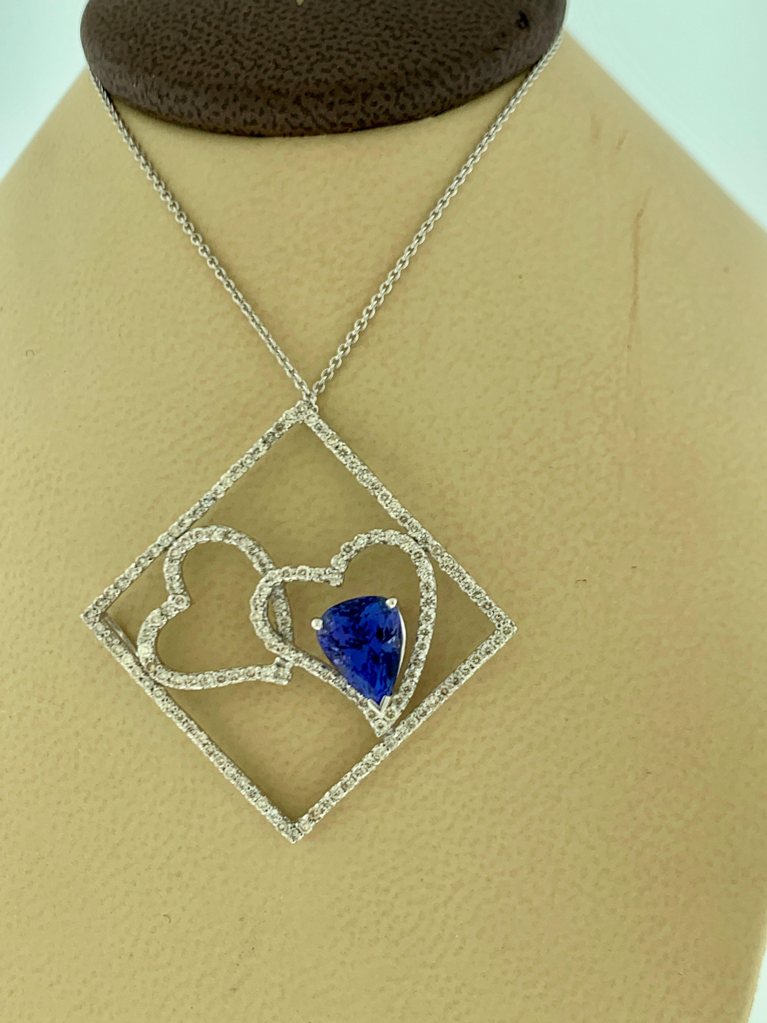 Women's 3 Carat Tanzanite and 2 Carat Diamond Two Heart Pendant/ Necklace 18 Karat Gold For Sale