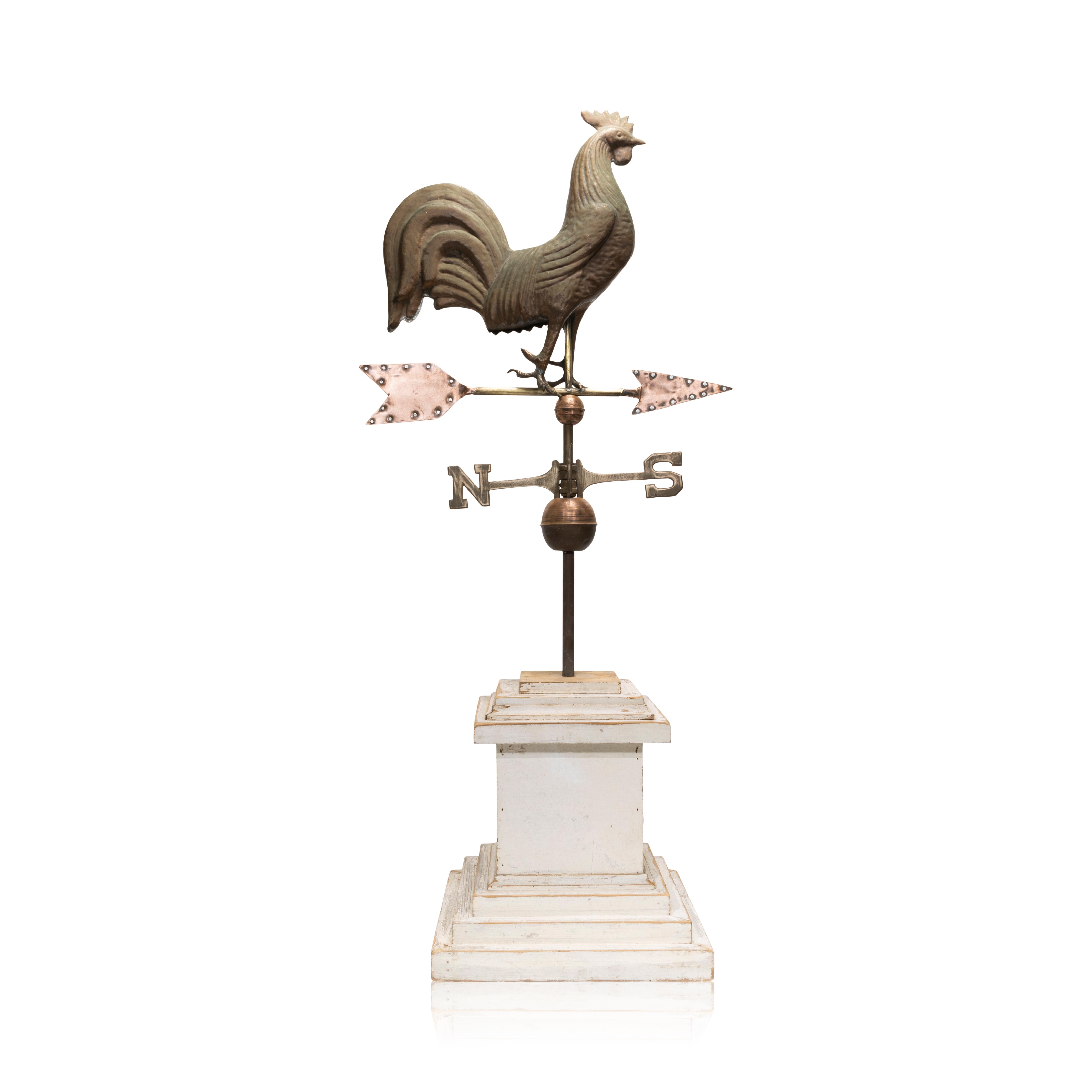 Copper rooster weather vane with directional arrow and N W S E. On more modern base. Arrow and ball have been polished. 62
