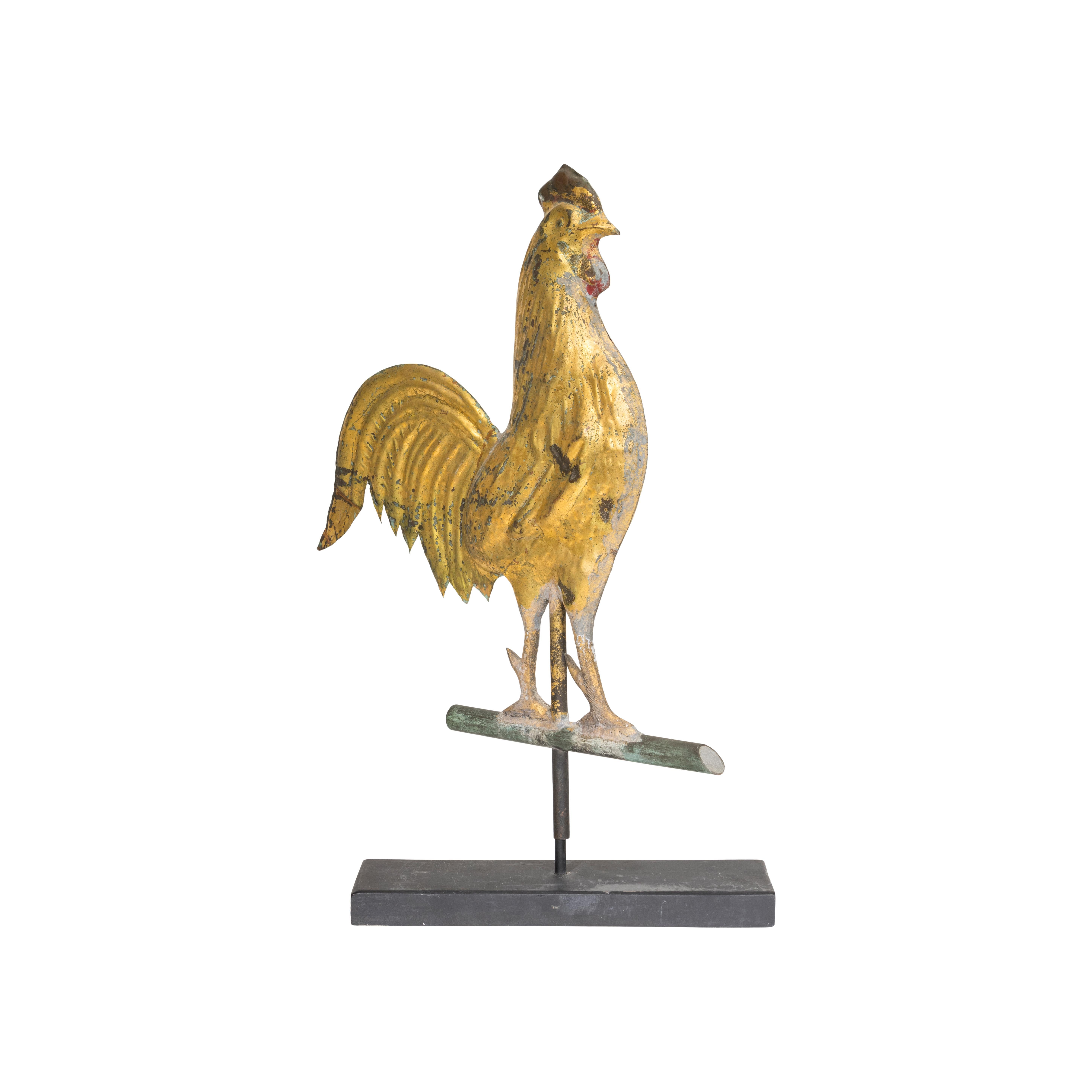 Early 20th Century 3 dimensional copper American rooster weather vane on more modern stand. Directional arrow clipped. Gold leaf finish. 16