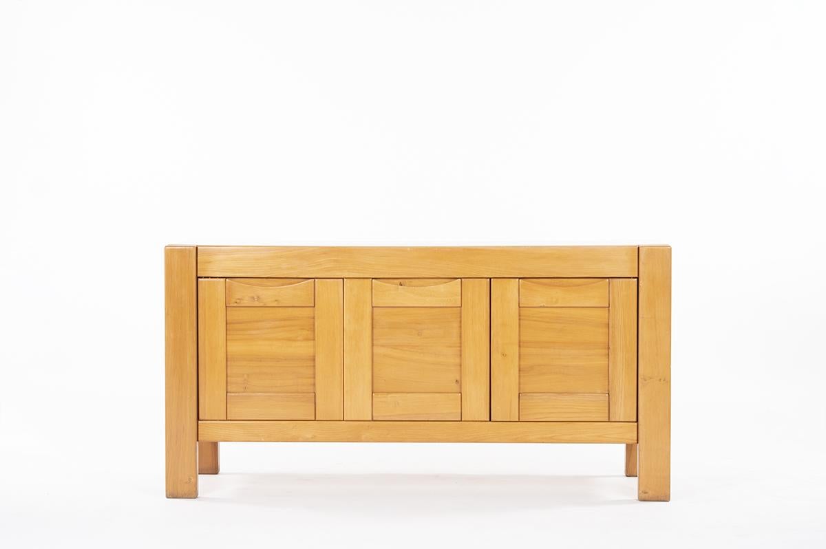 Large sideboard made by French company Maison Regain in 1980. Composed of 3 front doors, perfectly assembled in solid elm. 
In the manner of Pierre Chapo creations.
 