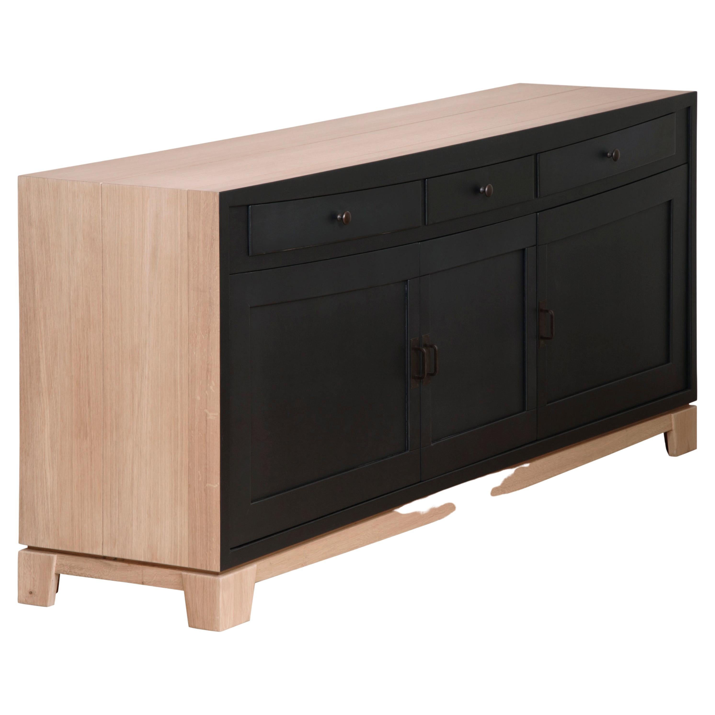 This 3 doors sideboard belongs to the SIENNA collection and was created by the French designer Christophe Lecomte. Christophe uses oak, as a French noble wood to enforce the feeling of durability and timeless lines of this collection. The straight