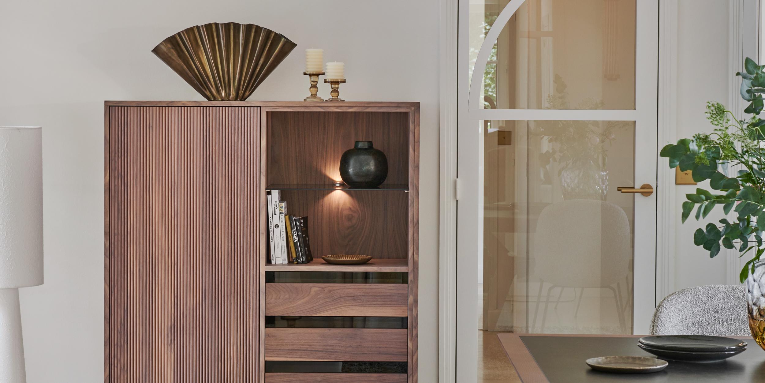 This cupboard belongs to our brand new collection CANNES and is designed by Christophe Lecomte, a French designer located on the French Atlantic shore. 
Christophe graduated from the notorious BOULLE school in 1990 and began his career in
