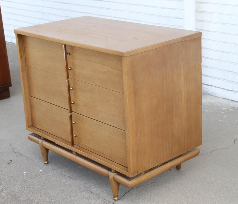 Rare 3 drawer dresser manufactured by Kent Coffey from the series “The Sequence.” 


Featuring three dresser drawers with long-rectangular brass-plated pulls.
Dimensions: 36 wide x 20 deep x 30.5 inches high.