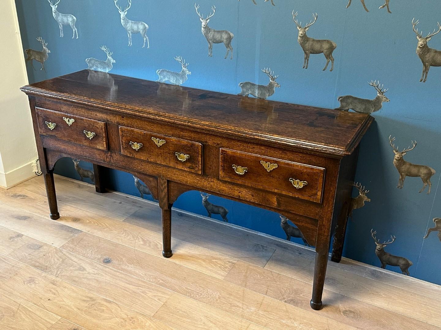 Beautiful 3 Drawer English Oak Dresser Base, antique server, antique sideboard. Table is early 18th century, ca. 1720. Completely in original and good condition. The table has a beautiful patina and appearance. Original drawer pulls. Great