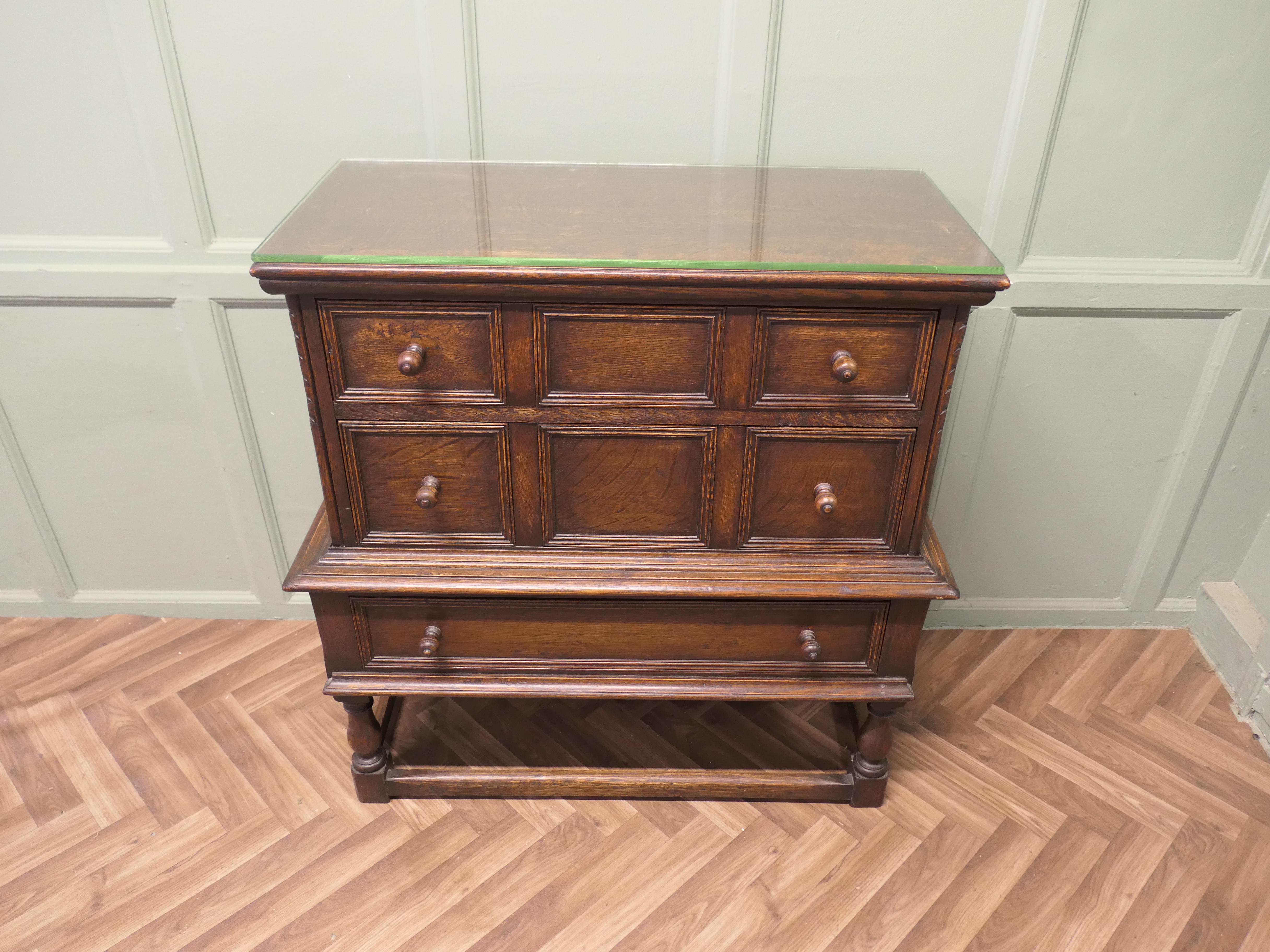 3 Drawer Oak Chest of Drawers

This is a beautifully proportioned chest with 3 long drawers, it is a tall piece as it is set on an integral stand. The fronts of the drawers are geometrically moulded.
The chest has a very pleasant patina and it is in