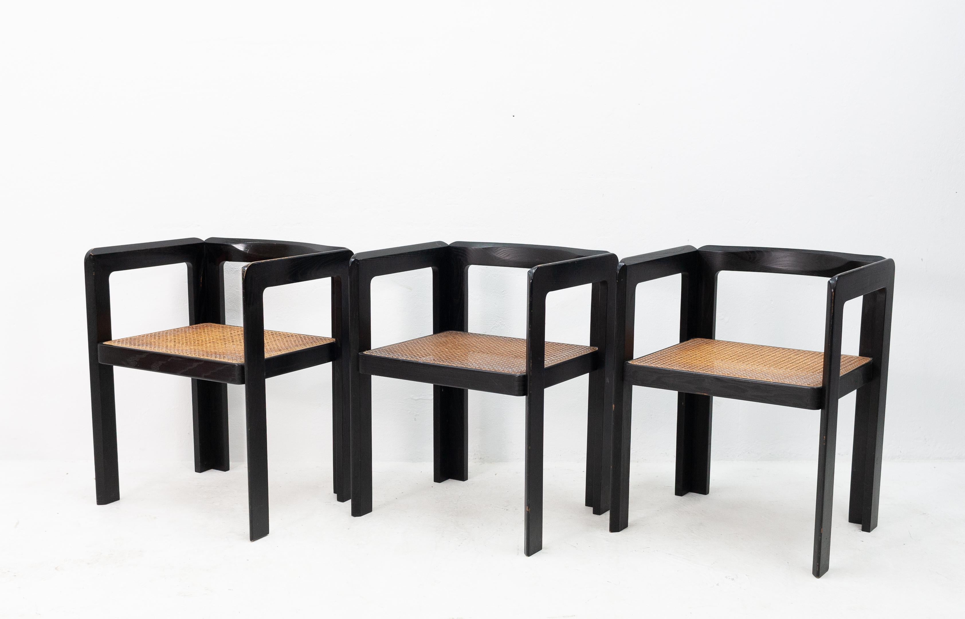 3 Ebonized Wood and Rattan Club Chairs 1