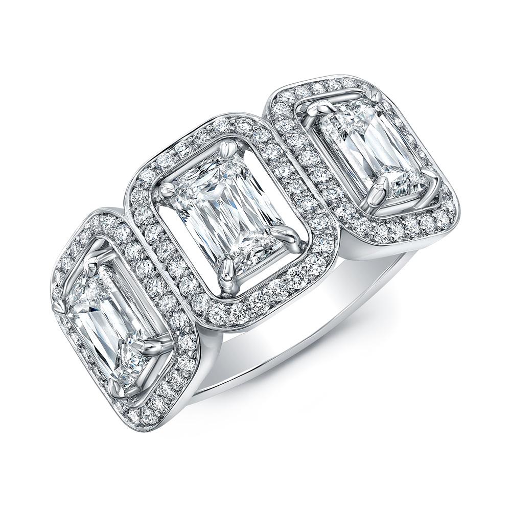 Modern 3 Emerald Cut Diamonds with Single Halo Pavé Ring For Sale