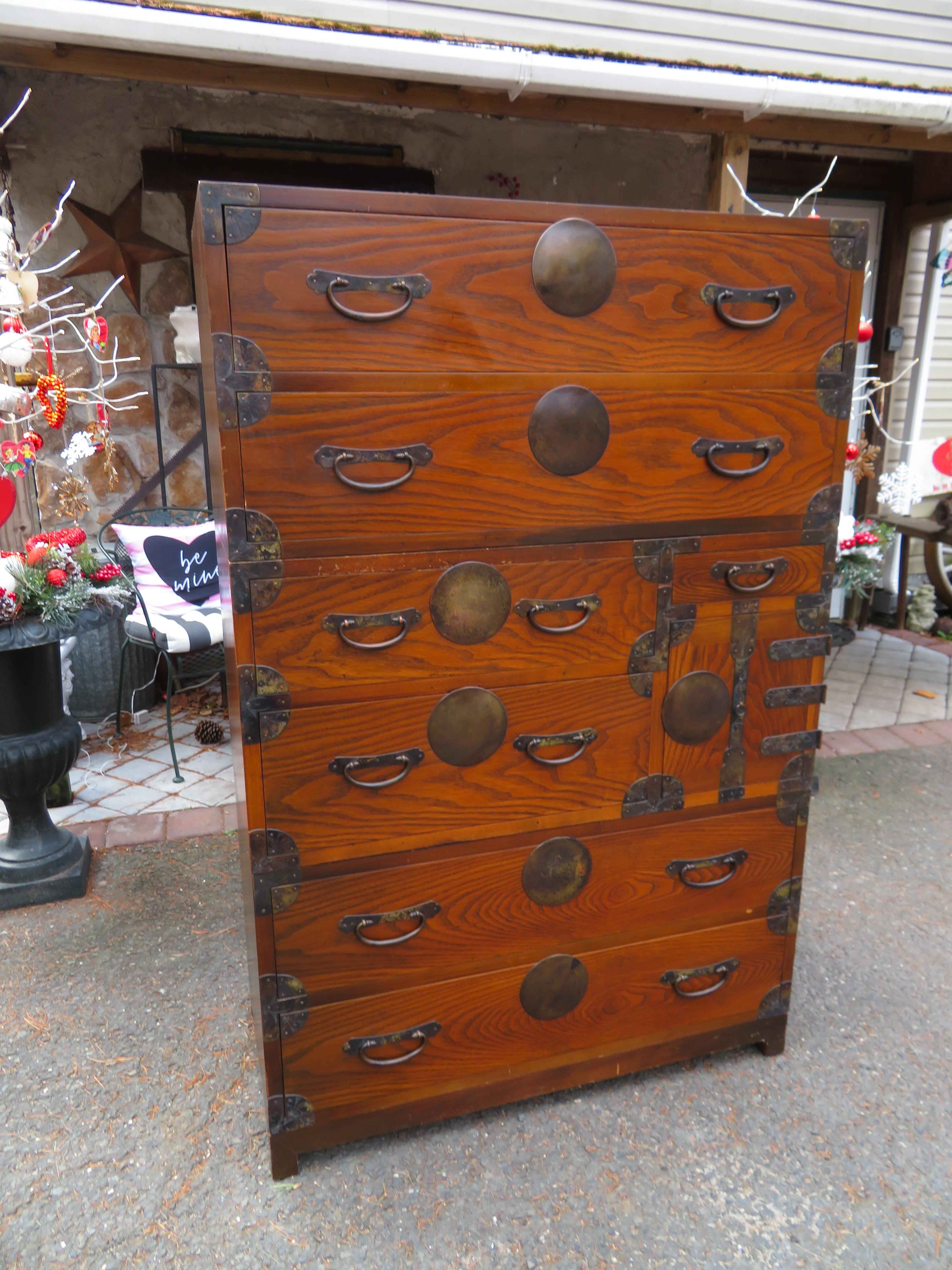 3 fabulous 20th-century Japanese-style stacking Tansu chests of drawers.
Each section can be used separately for versatility or stacked together to save space. 
Originally used to store Japanese kimonos, obi and accessories, its present-day use