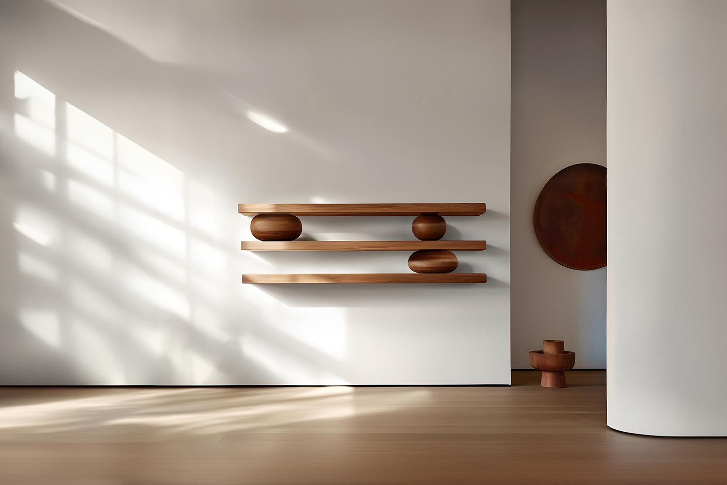 Set of Three Floating Shelves with Three Sculptural Wooden Pebble Accents, Sereno by Joel Escalona

—

What happens when the practical becomes art?
What happens when ornamentation gains significance?

Those were the questions Joel Escalona