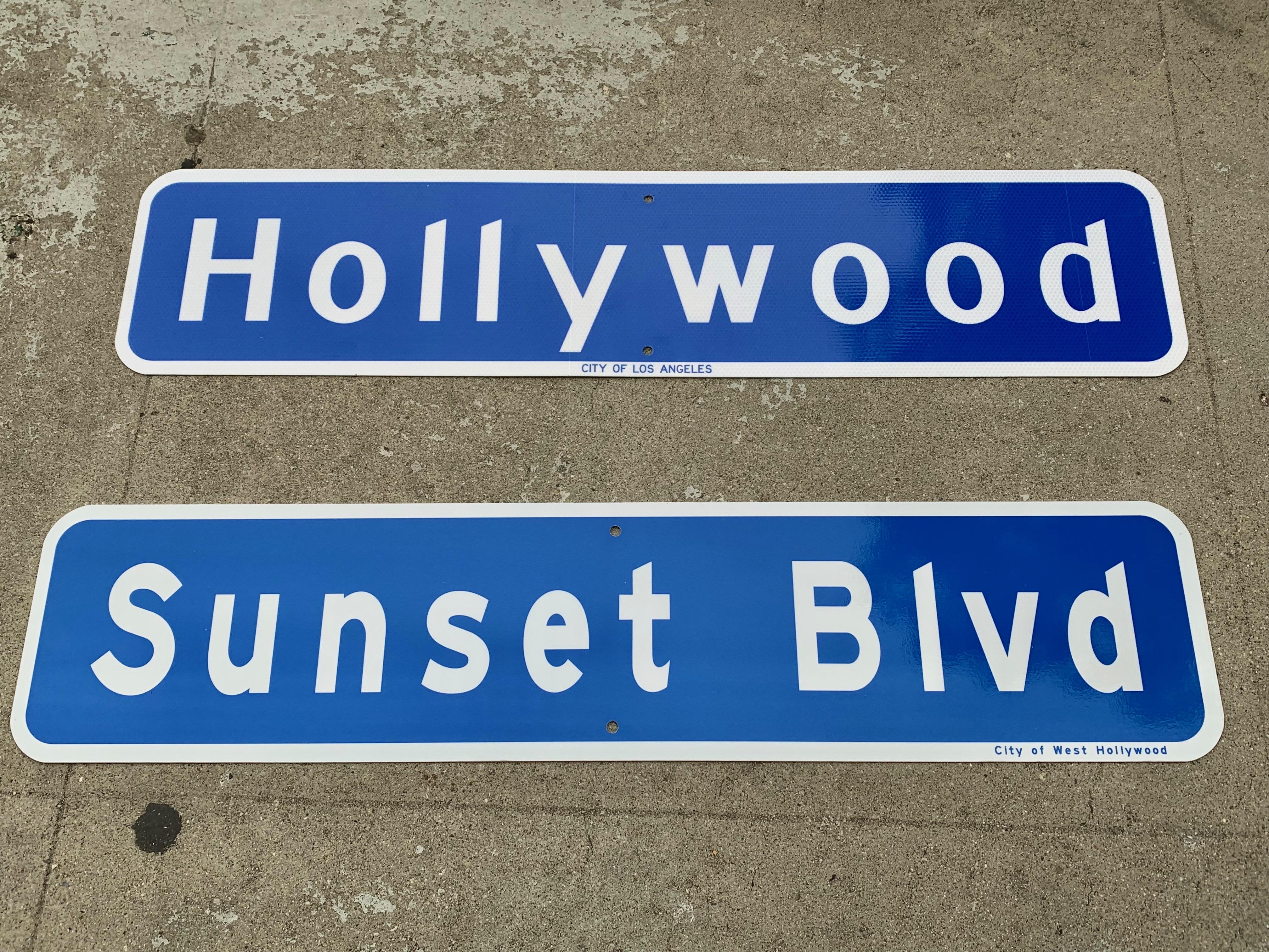 Very cool street sign from the city of Los Angeles. Hollywood blvd sign with white lettering on blue background. Extremely good condition. Marked city of Los Angeles on the front. 

  