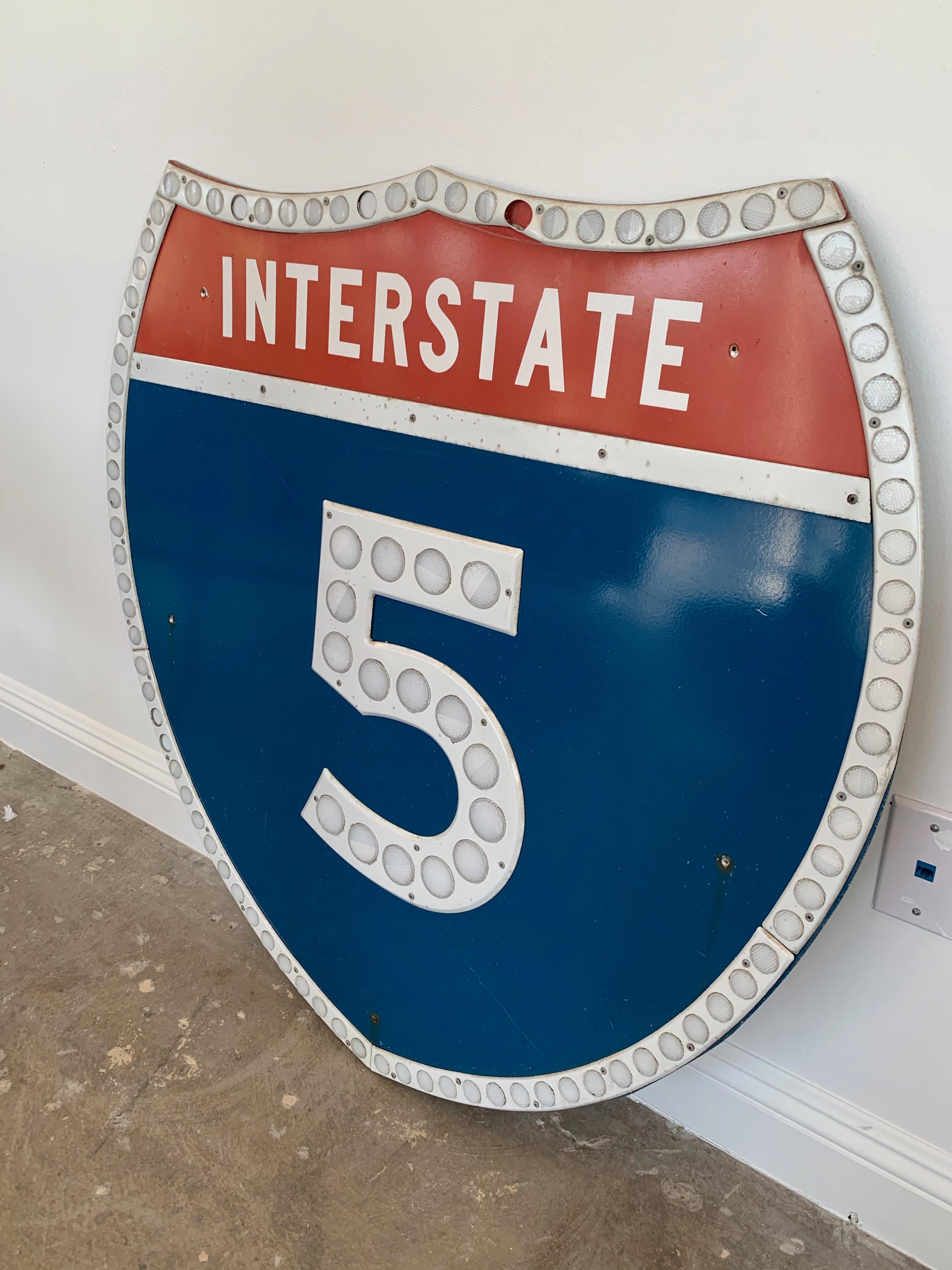 Vintage Los Angeles freeway shield from the 5 freeway in Los Angeles. Interstate 5 runs from the Tijuana/California border all the way up to the Canadian border near Blaine, Washington. It runs parallel to the Pacific Ocean the entire route. This