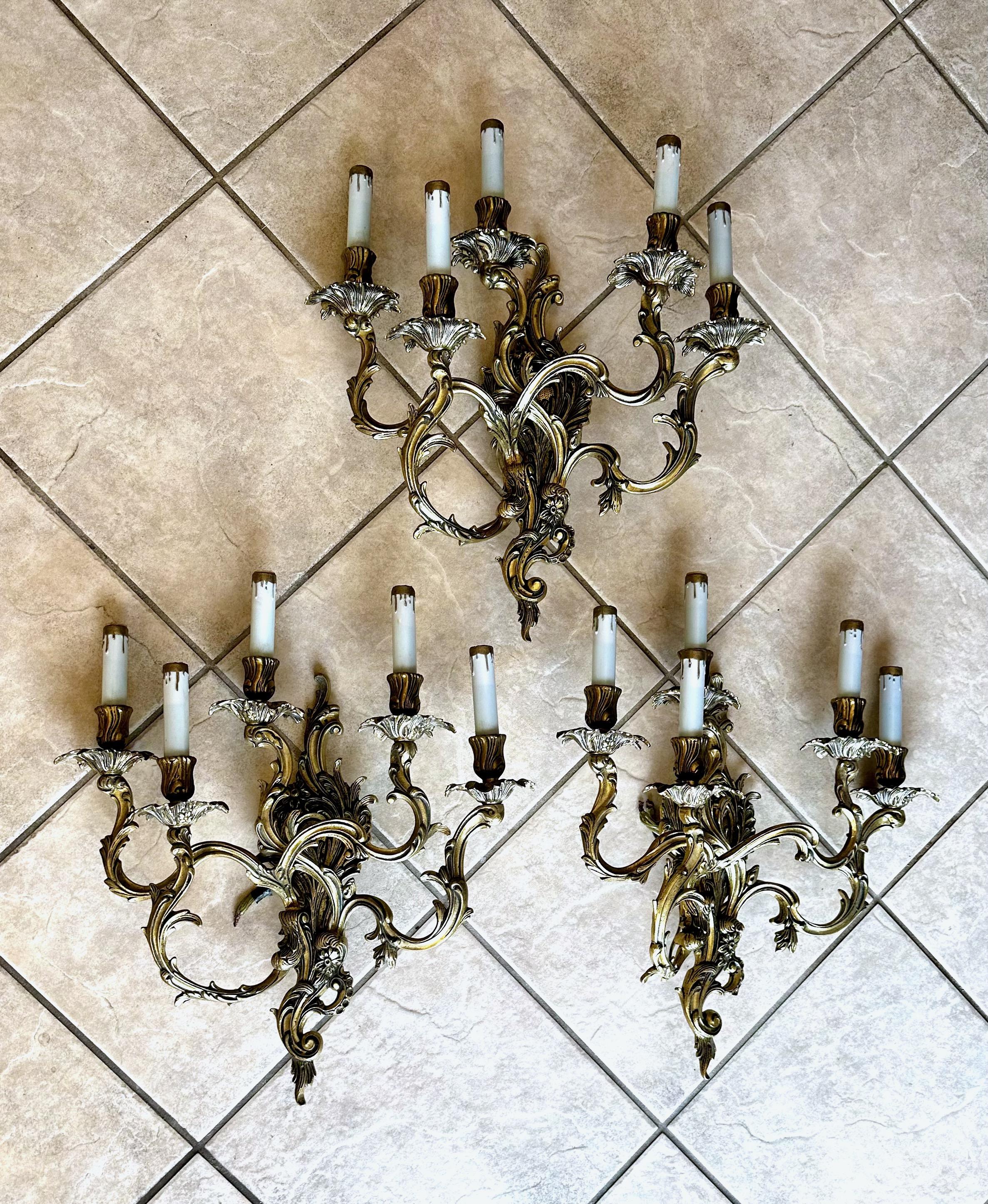 Set of 3 (three) large 1960s French Louis XV rococo style 5 light brass candle wall sconces. Nicely executed throughout. 