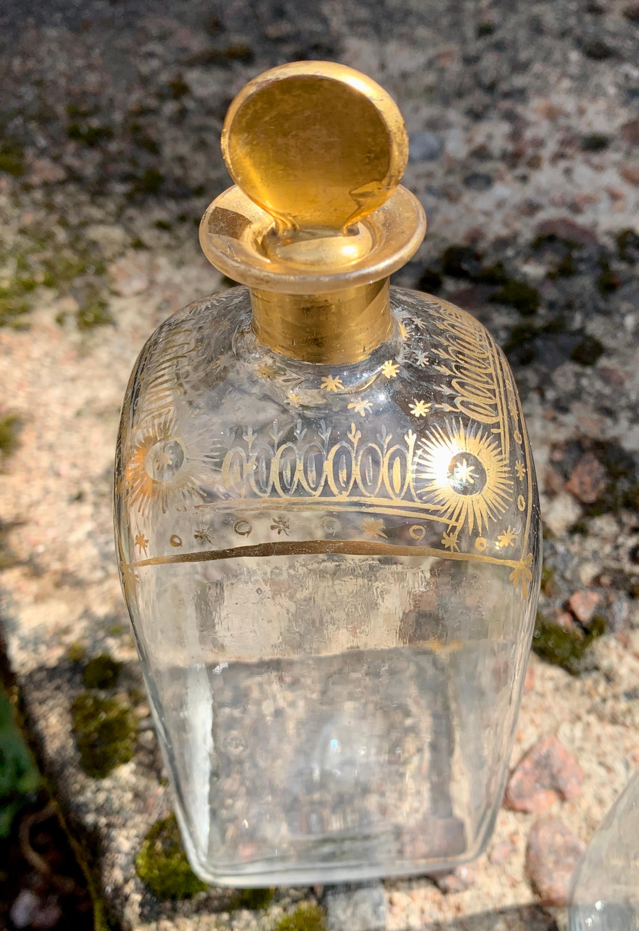 Early 19th Century 3 French Louis XVI Hand-Blown and Gold Decor Liquor Bottles For Sale