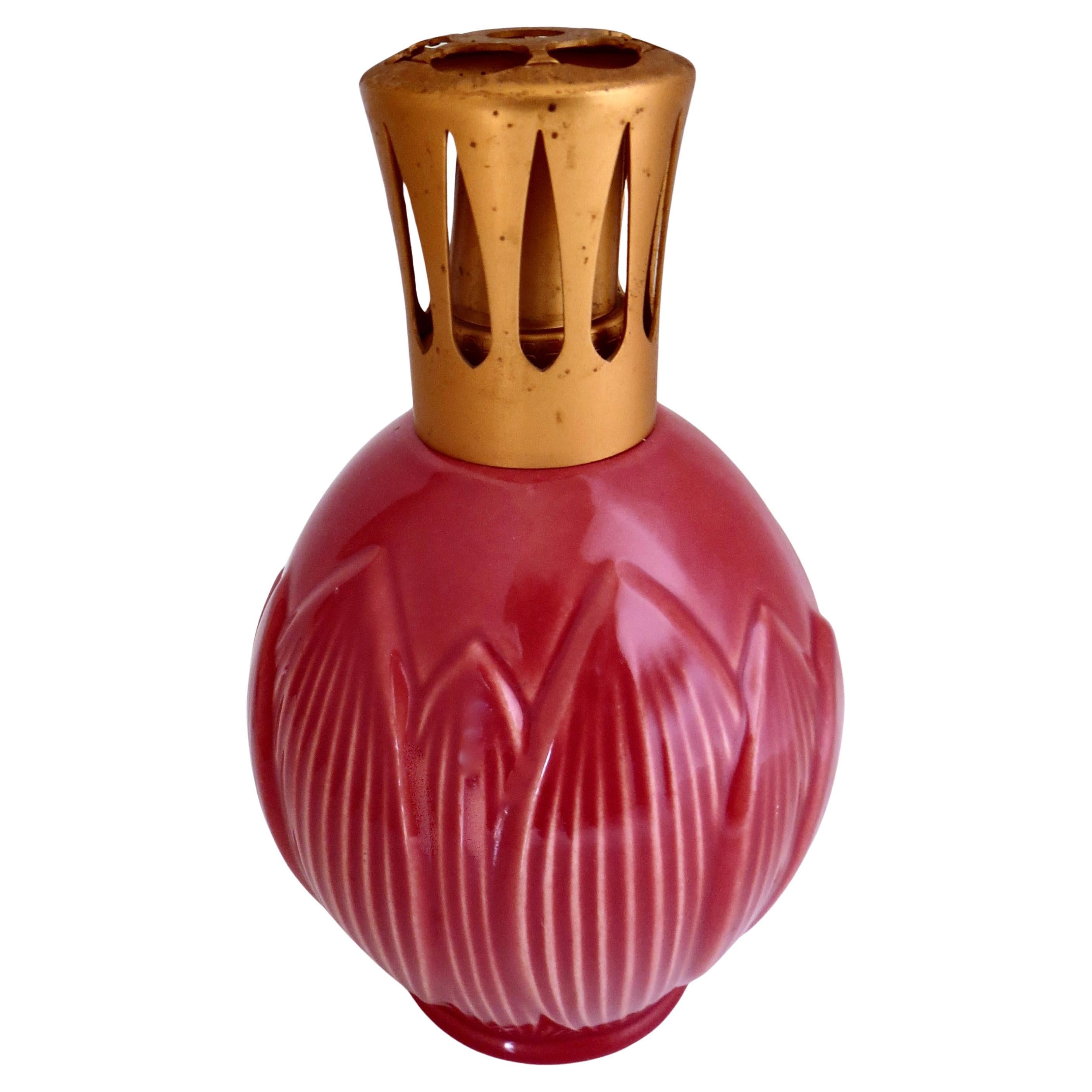 Offered here are three nice quality authentic glass, post-war French fragrance diffusers used to freshen up and make a room or area smell nicely. Sometimes called aroma oil lamps, the fragrance was placed in the bottle along with the lamp oil, and