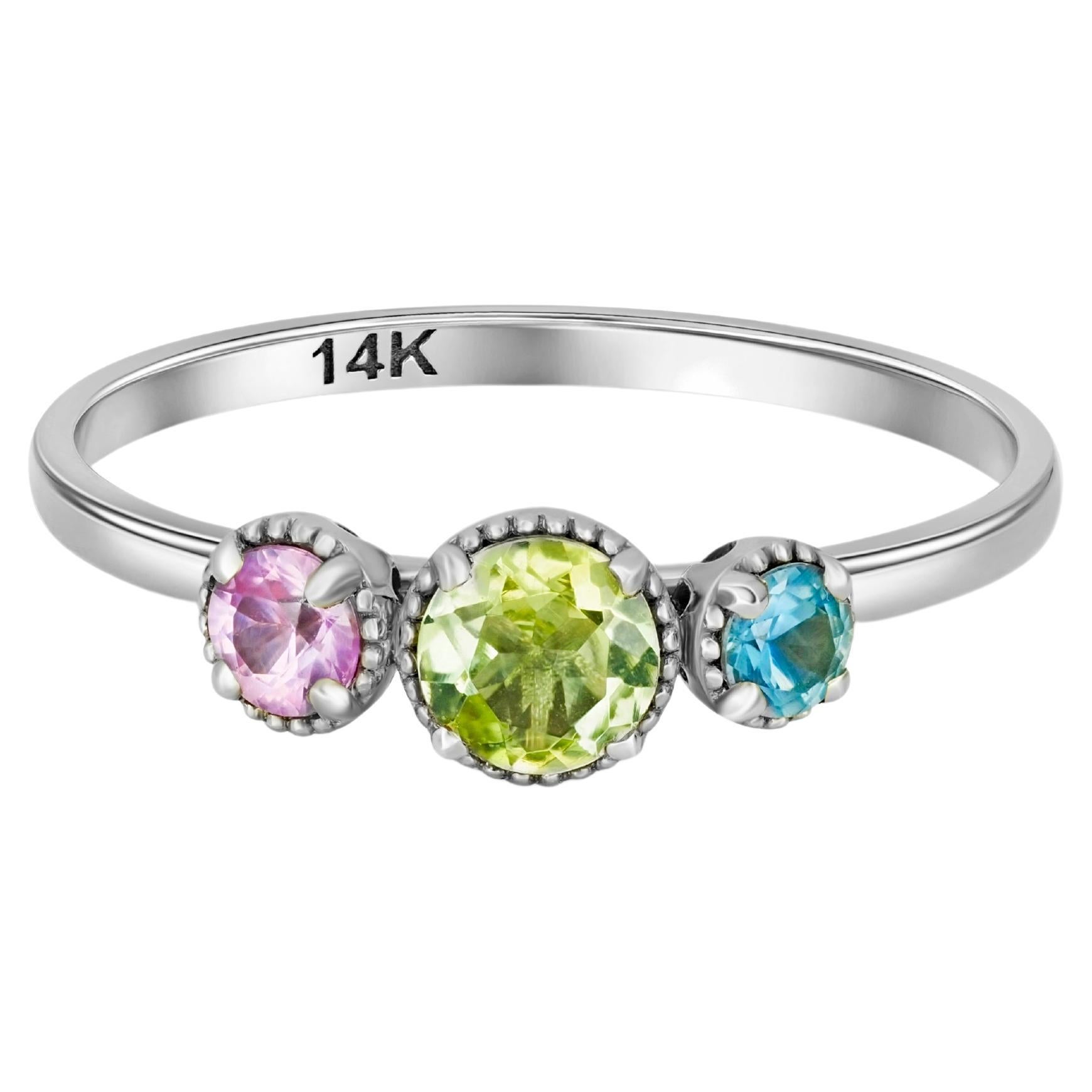 3 gemstone gold ring: sapphire, tourmaline. Three-Stone gold Rings


Weight: 1.50 g. 
Metal: 14k gold

Gemstones:

Sapphire: color - pink
round cut, 0.15 ct. approx
Clarity: Transparent with inclusions

Sapphire: color - blue
round cut, 0.08 ct.