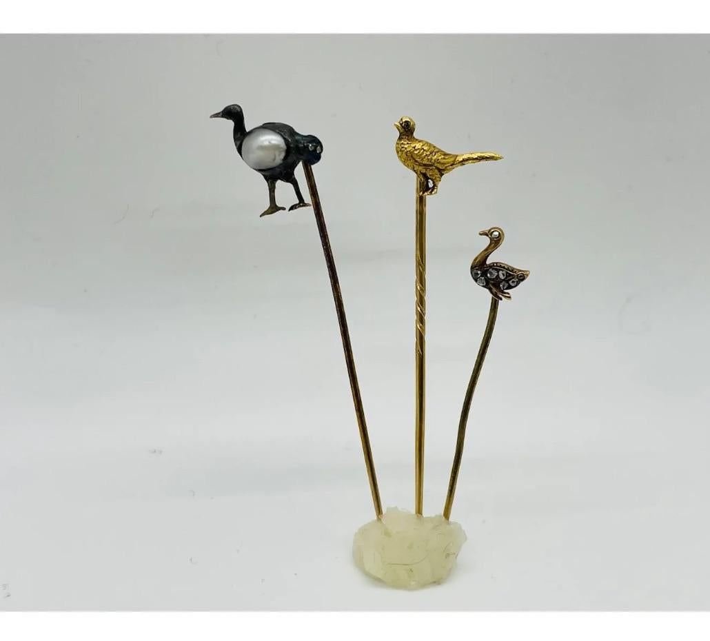 Gold Diamond Enamel Natural Pearl Bird Stickpins

Consistent with age and use please see the photos for condition
Please ask for more photos if you need we will send them with in 24-48 hours

Due to the item's age do not expect items to be in