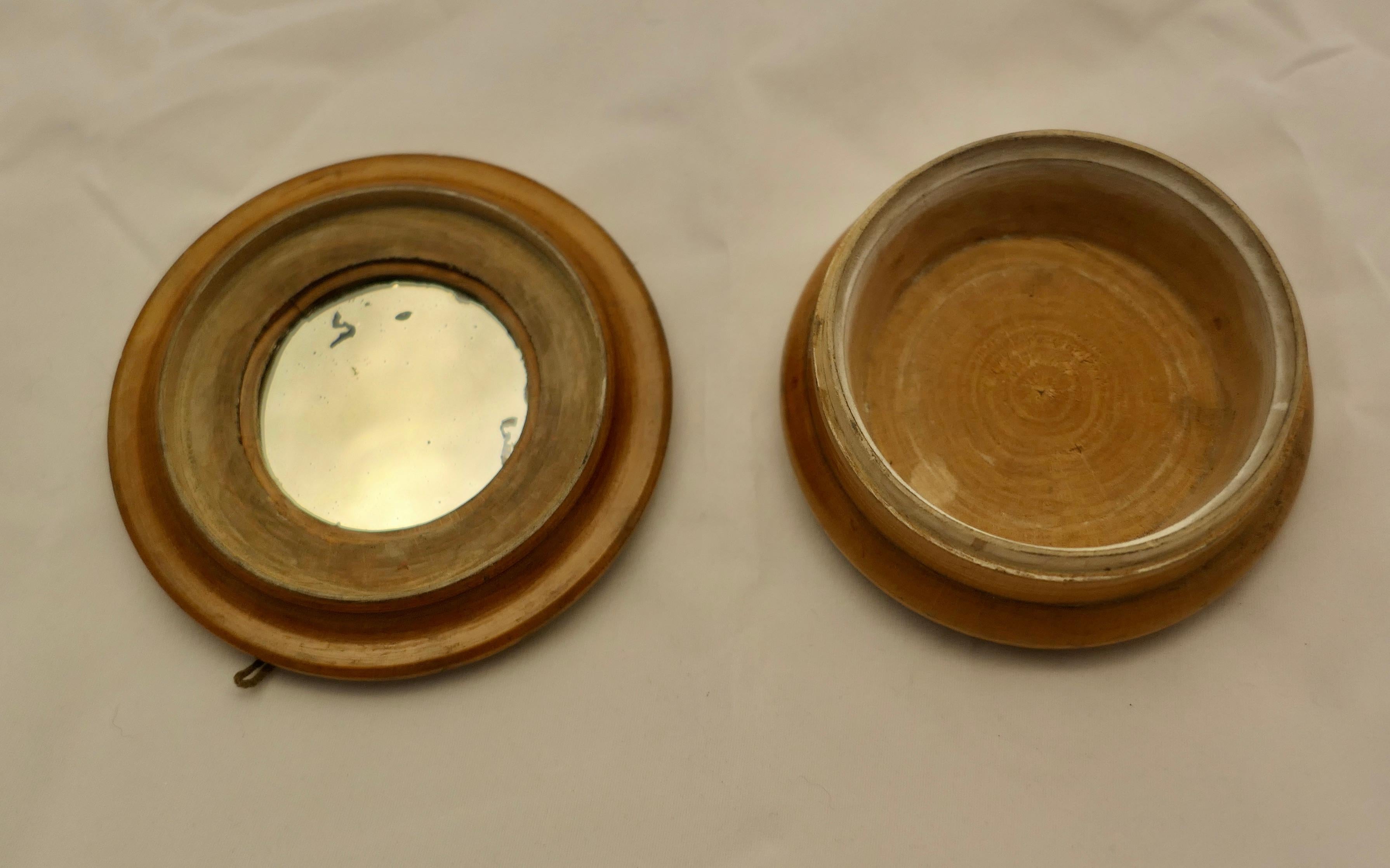 3 Hand Made Sycamore Treen Pots 1 with Miniatures 

The first pot is a powder pot with an internal mirror
No2 is a salve pot lovely piece 
And the smallest contains a tiny carafe and 6 goblets, there is a tiny chip on the foot of one goblet
Hand