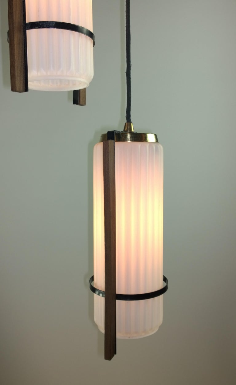 3 Hanging White Fluted Glass Shades w/ Walnut Trim and Black Canopy