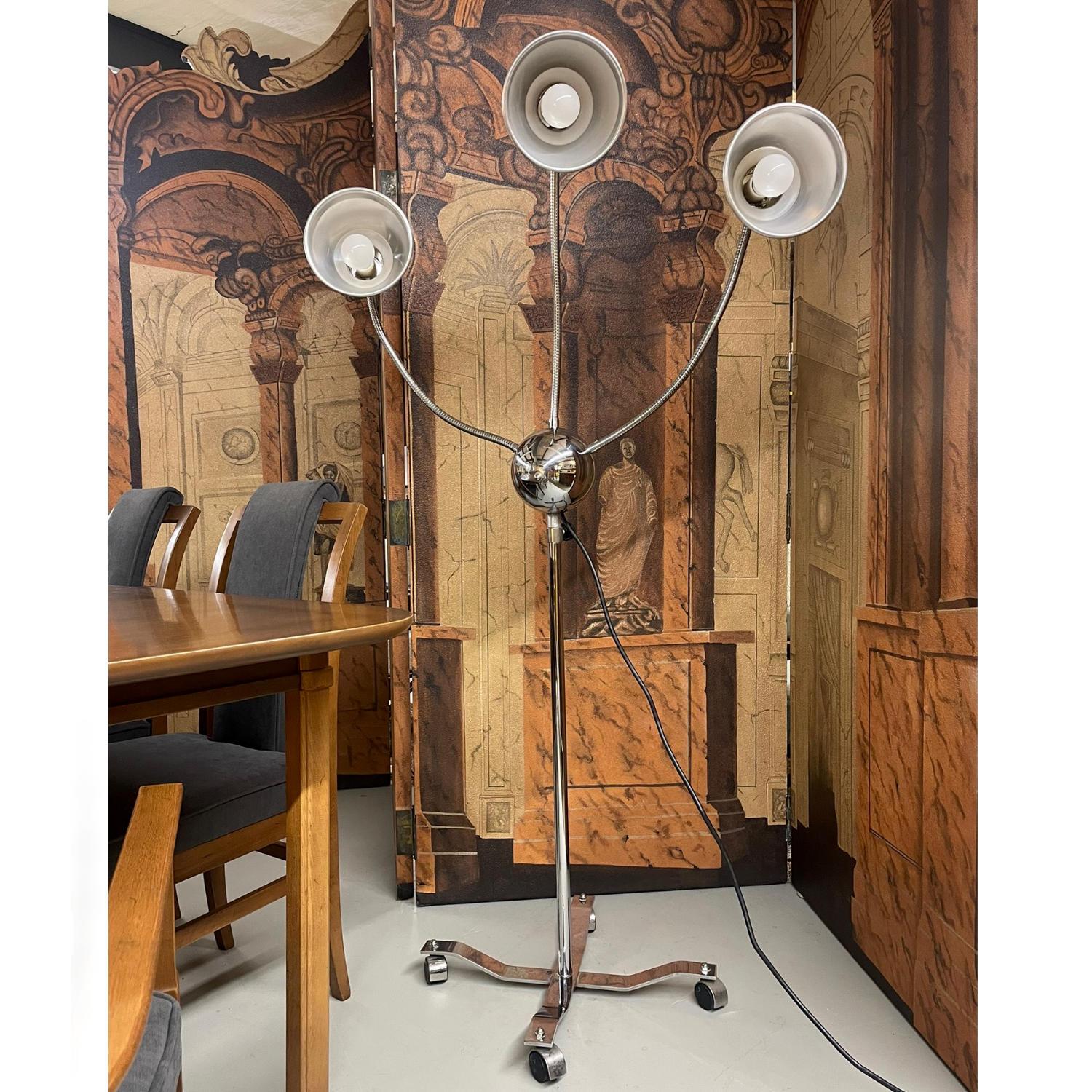 Let there be light! This 3 head, snake neck, adjustable height floor lamp is a powerhouse! This is the ideal lamp for an artist’s or craftsperson’s studio. Get tons of light, where you need it. The three snake necks are adjustable, allowing you to