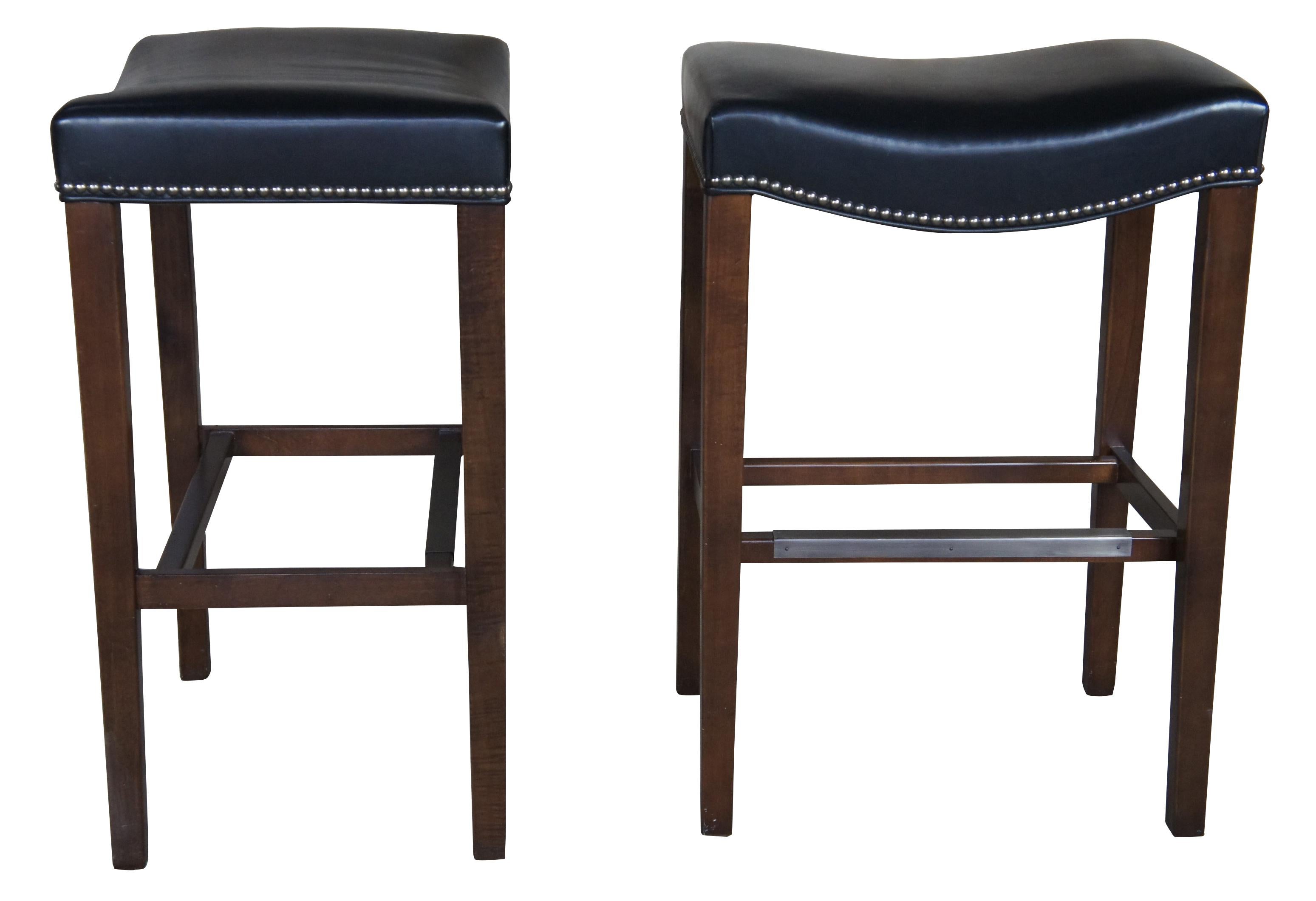 3 Hickory chair Company Madigan backless bar stools 5750-05 dark walnut

The Madigan stool (SKU:5750-05) by Hickory chair is a neutral and inviting piece that brings joy to any home.

Inspired by a set of antique chairs of Danish and Cuban