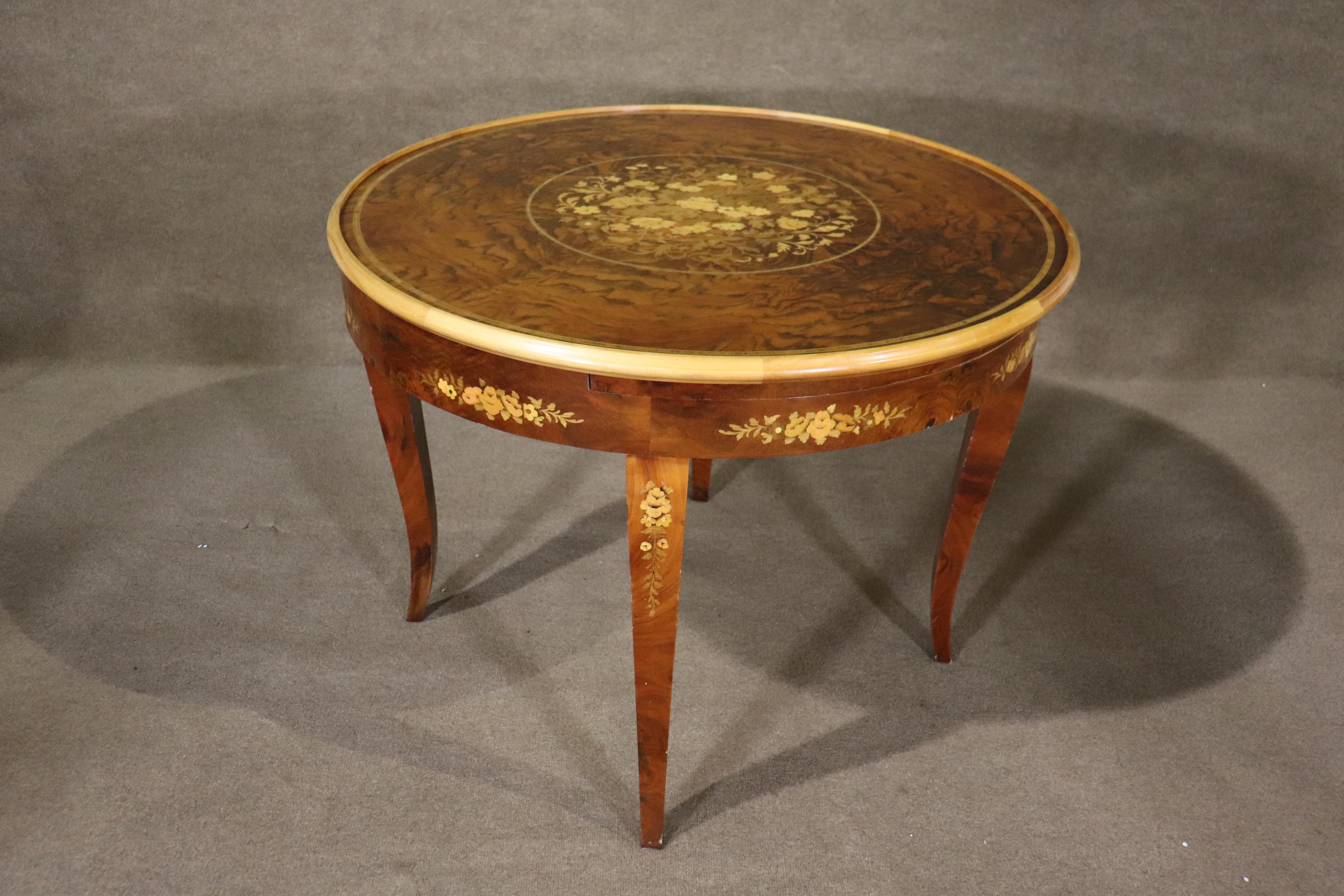 Beautiful Italian game table with marquetry inlay designs. The top is exquisite and comes off to reveal a chess board, backgammon, and roulette games.
Please confirm location NY or NJ