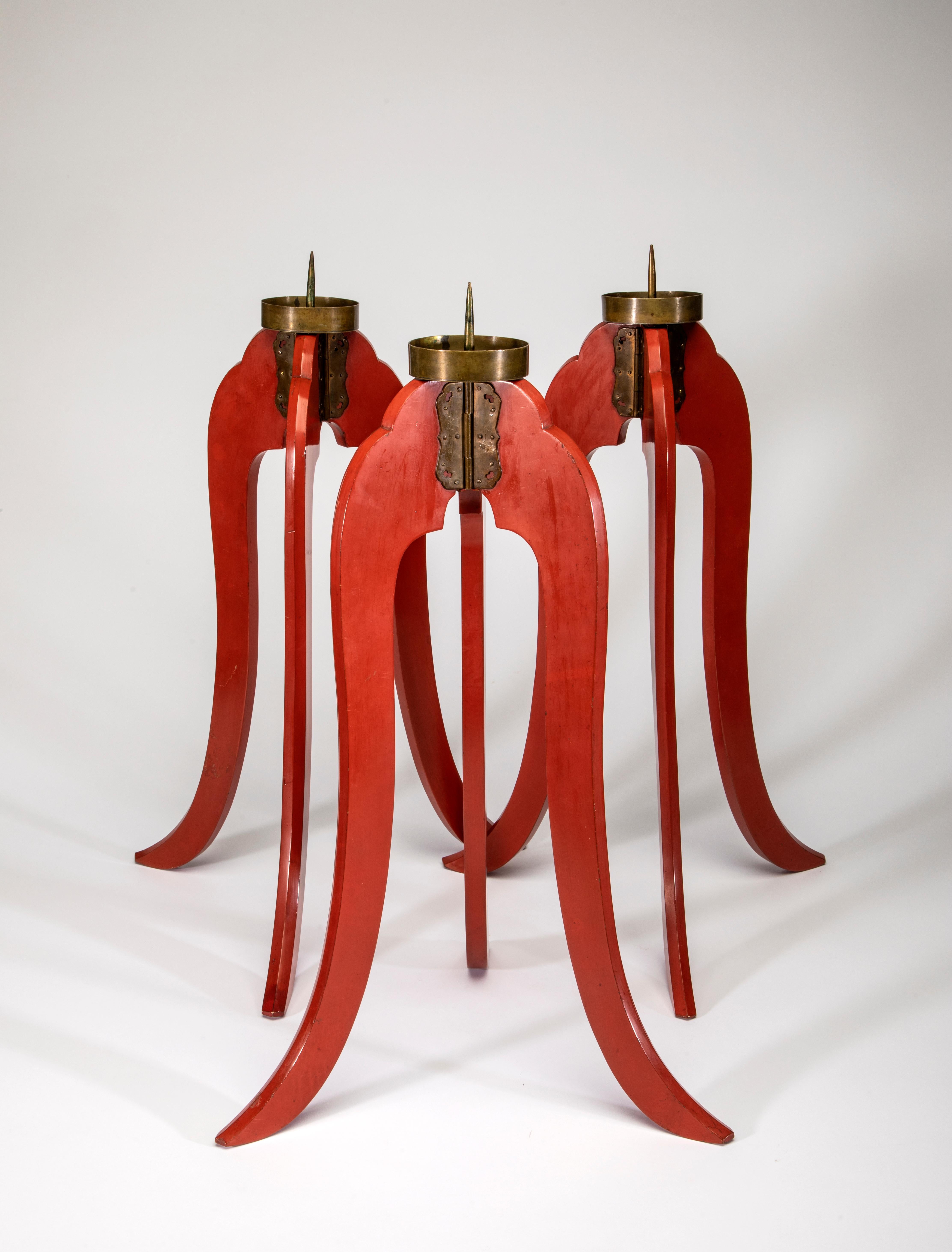 3 Japanese red Lacquer candlesticks
Many coats of persimmon/red lacquer applied to wood
Brass cap end fittings
Elegant bevel-cut on front-edge of each leg
Fold for storage (see last image/photo)
Late Meiji Period 1900 – 1912
Excellent