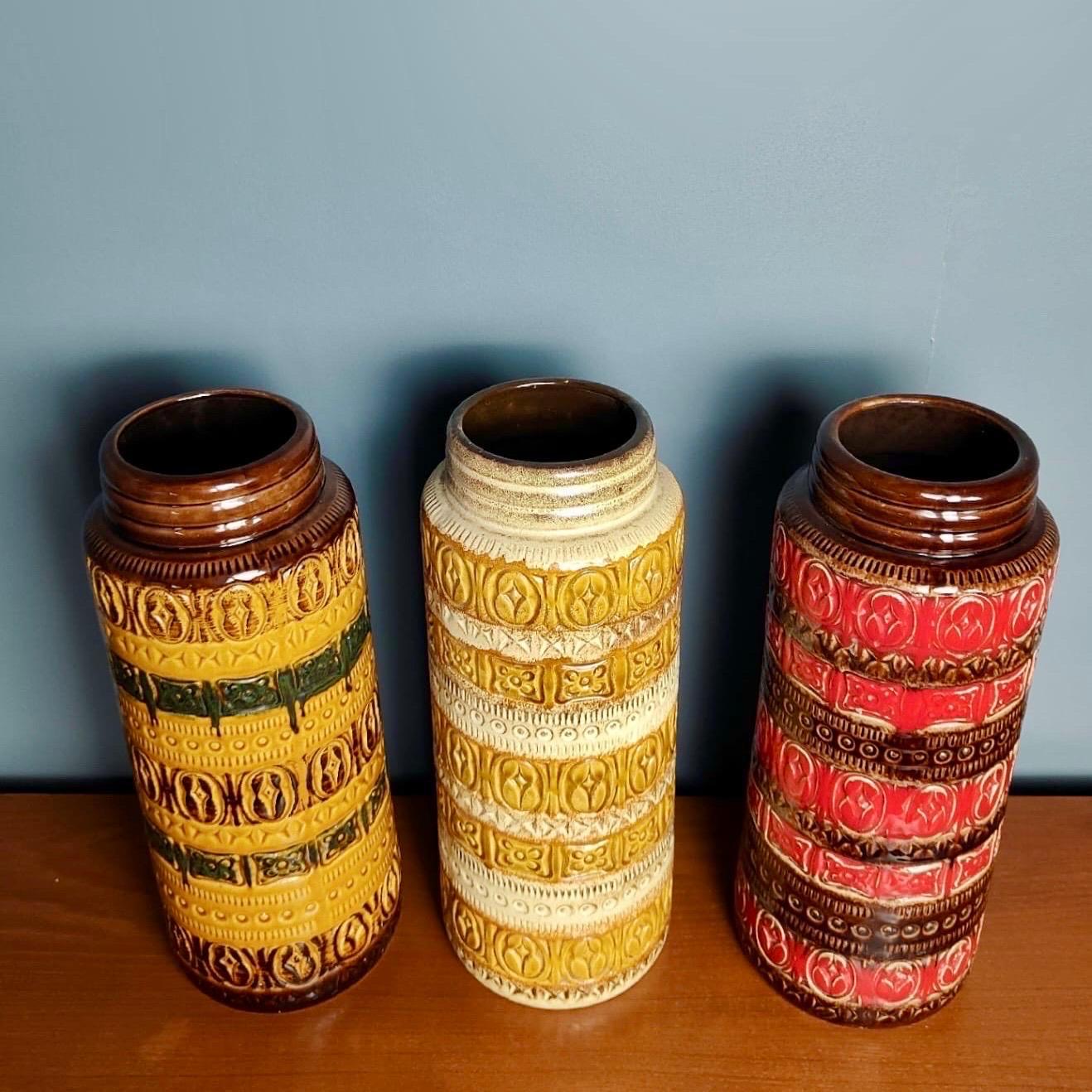 New Stock ✅

3 Large West German Vases Pottery Mid Century Vintage Retro MCM

Selling as a set of 3.

Great mid century colours and in perfect condition. No chips or cracks to them.

Dimensions
Height - 41cm
Width - 15cm
Depth - 15cm
Diameter - 15cm