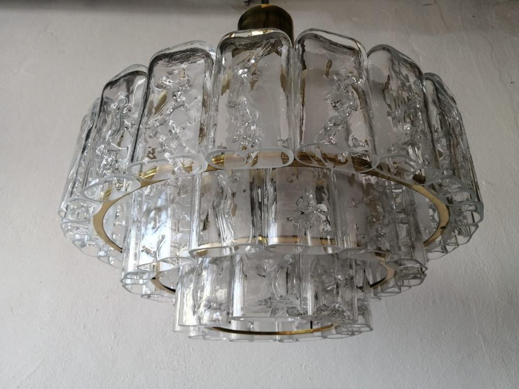 3 layered ice glass & brass body large chandelier by Doria Leuchten, 1960s, Germany 

High class quality blown ice glass pendant lamp

Lampshade is in very good vintage condition.
No crack, no missed piece.
Original metal canopy.

This lamp
