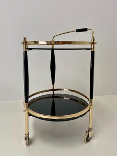 Chariot de bar à 3 pieds en laiton italien du milieu du siècle avec verre fumé et Wood Wood ébonisé