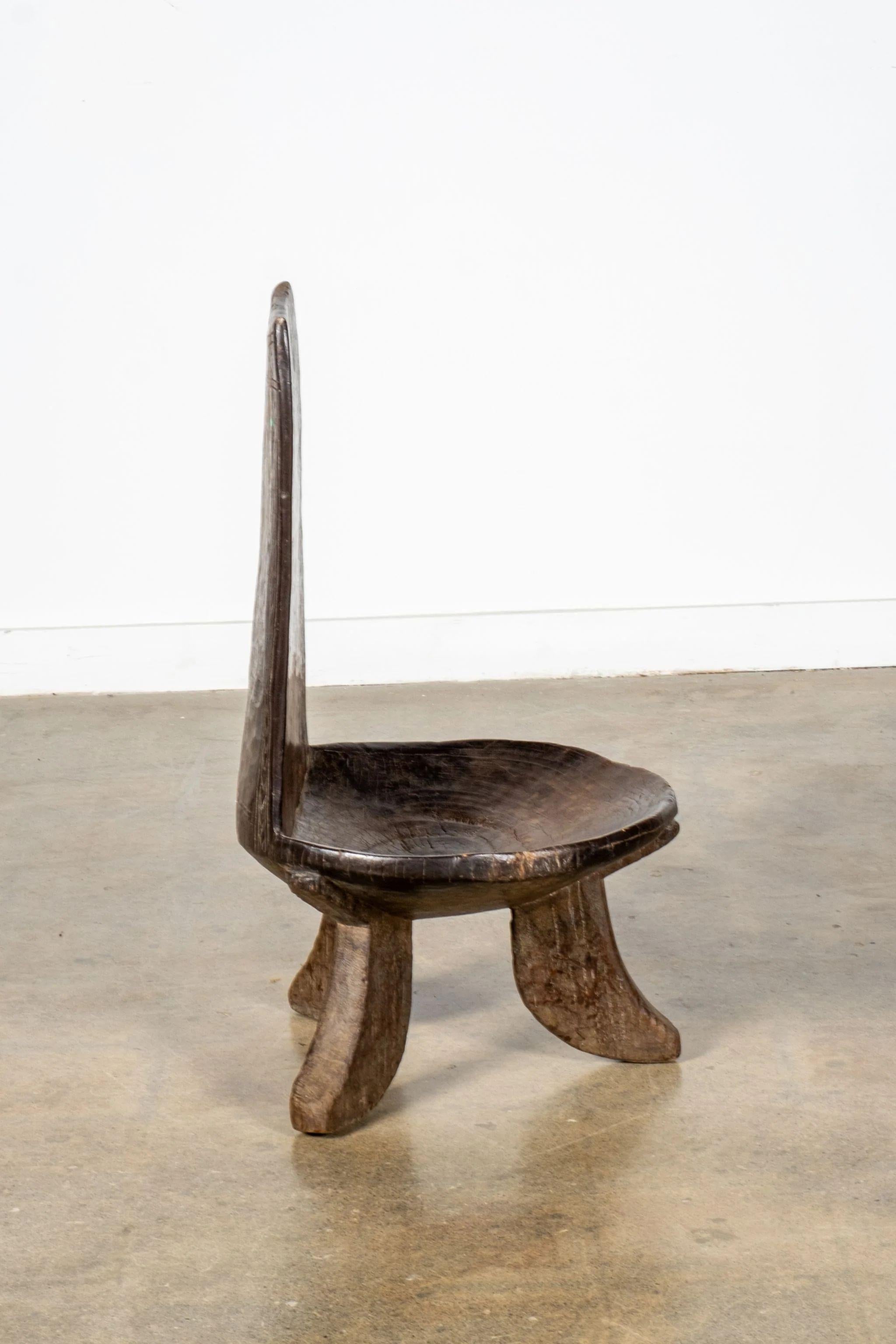 Brutalist 3-legged African Wood Chair with Flat Back For Sale