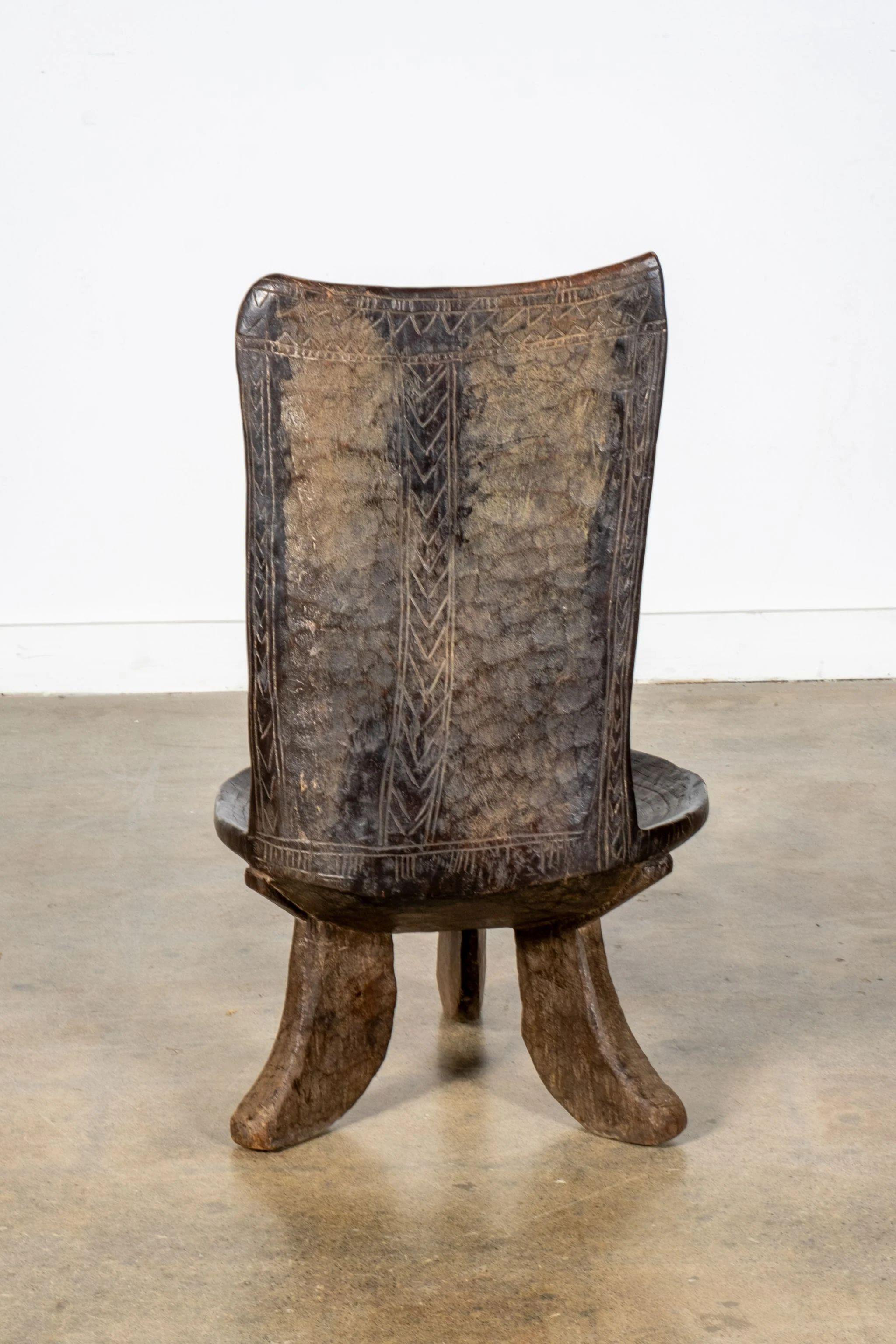 3-legged African Wood Chair with Flat Back For Sale 1