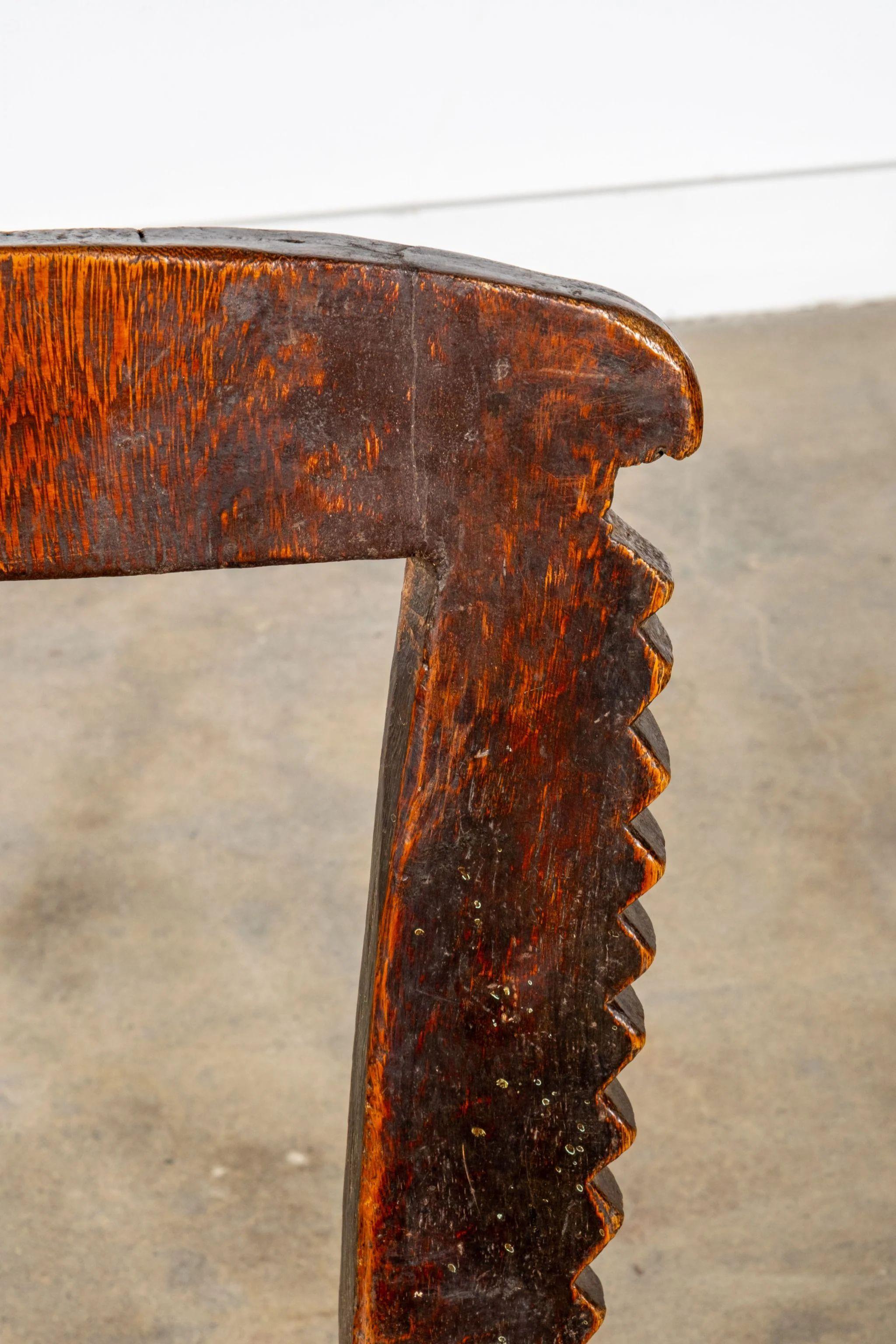 3-legged African Wood Chair with Scalloped Back 1