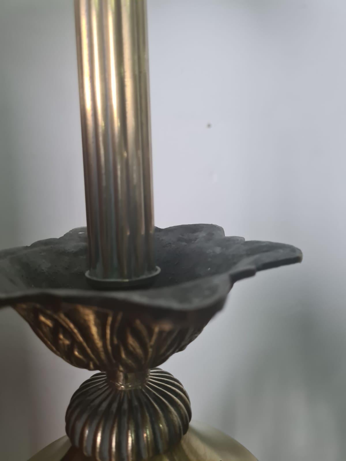 3-light brass and glass chandelier produced in circa 1950 by the architect Luigi Caccia Dominioni.