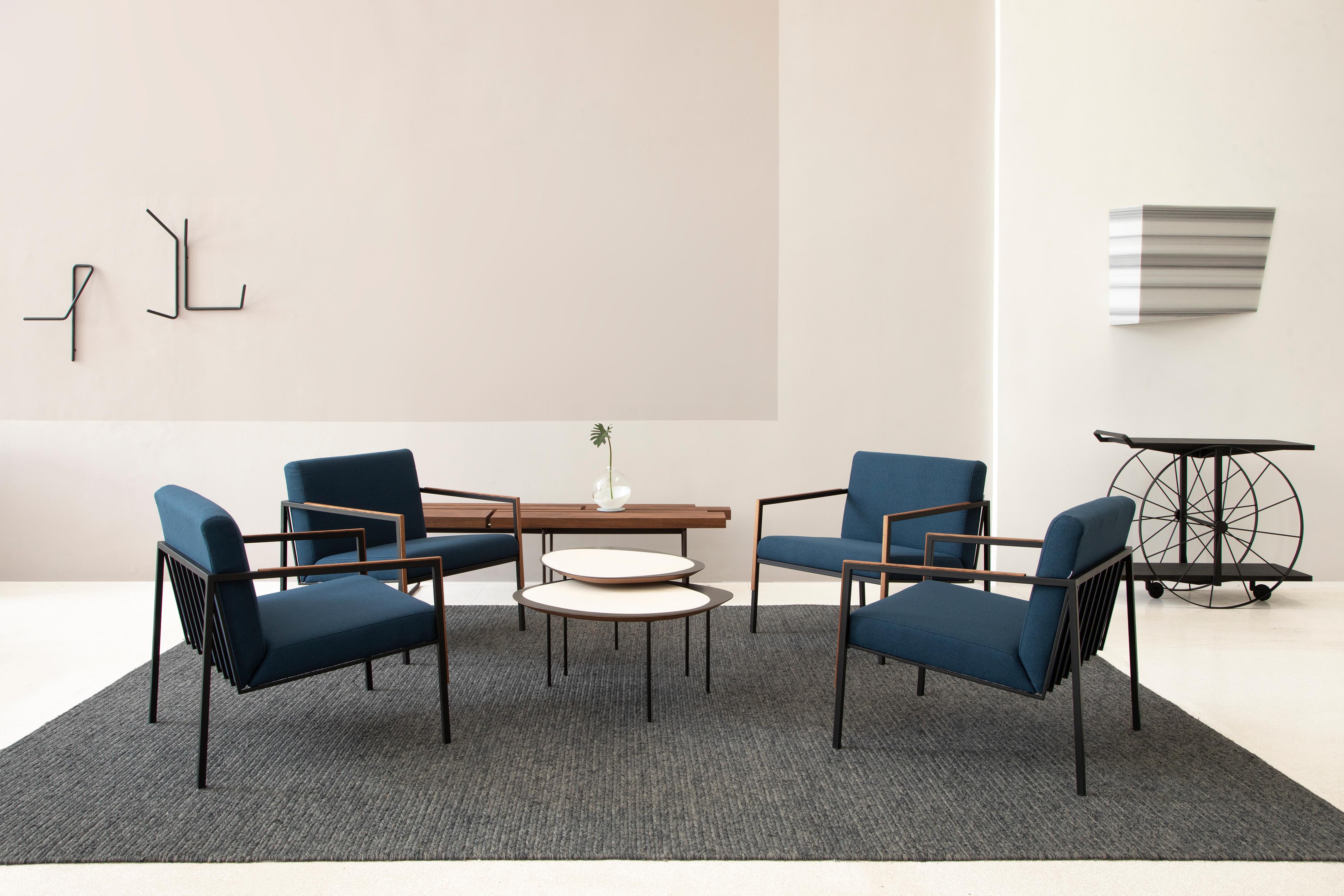 The Margem line was born from a process of graphic and pictorial exploration, where shapes and compositions emerged from an intuitive, free-flowing approach. Initially guided by contrasts—full and empty, light and dark, outline and content—the