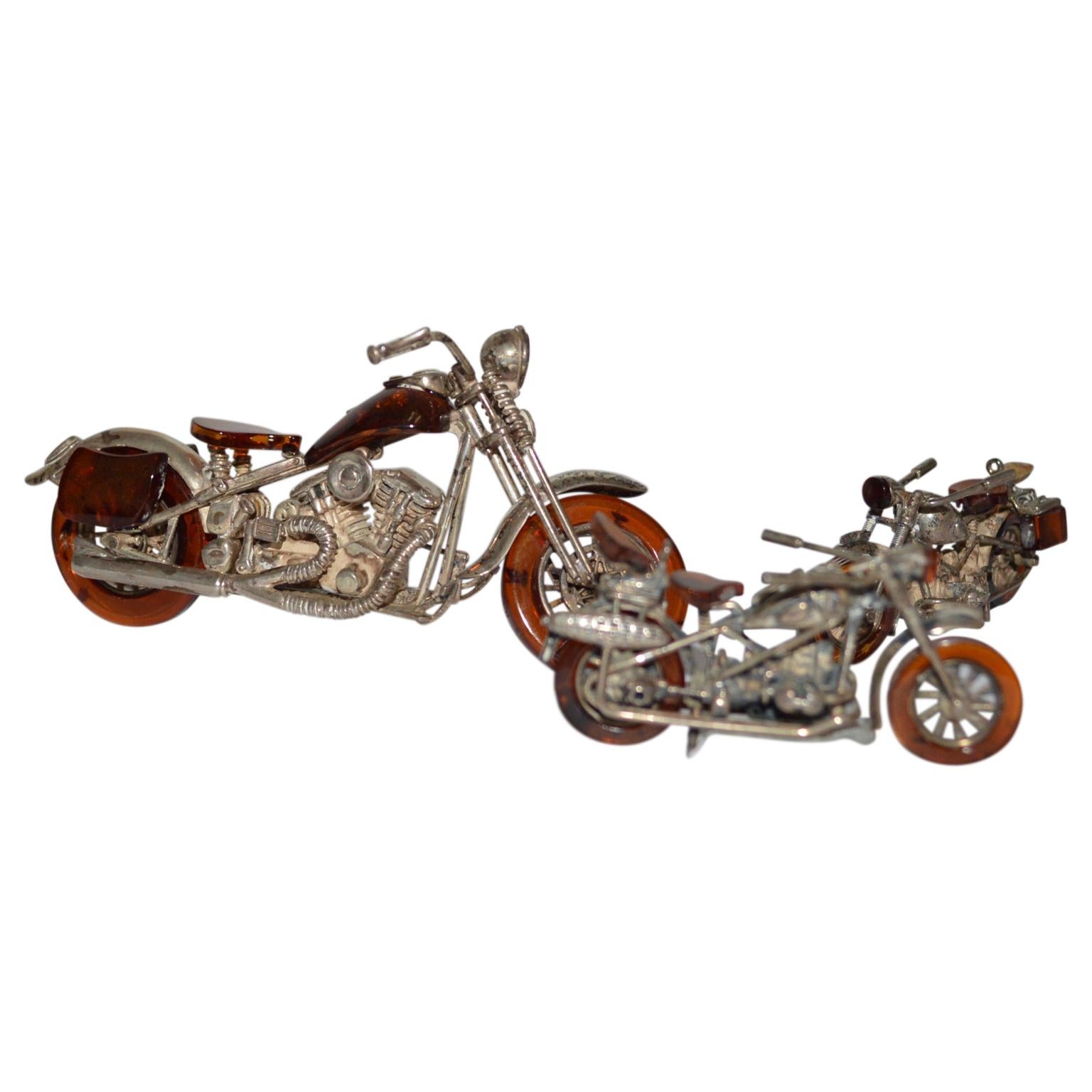 Set of 3 Miniature Amber and Silver Harley Davidson Style Motor Bikes
925 stamped silver.