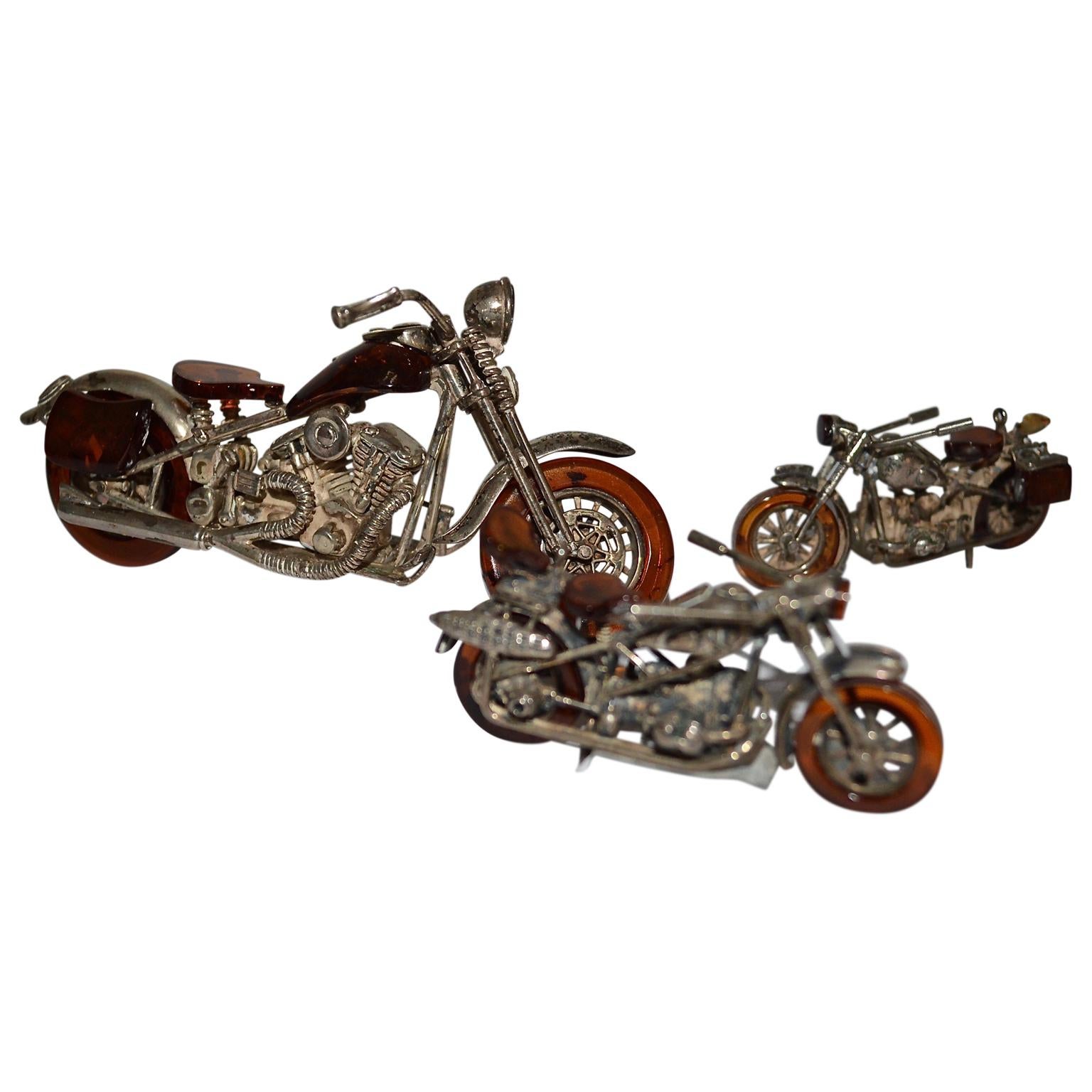 Set Of 3 Miniature Amber And Silver Harley Davidson Style Motor Bikes For Sale