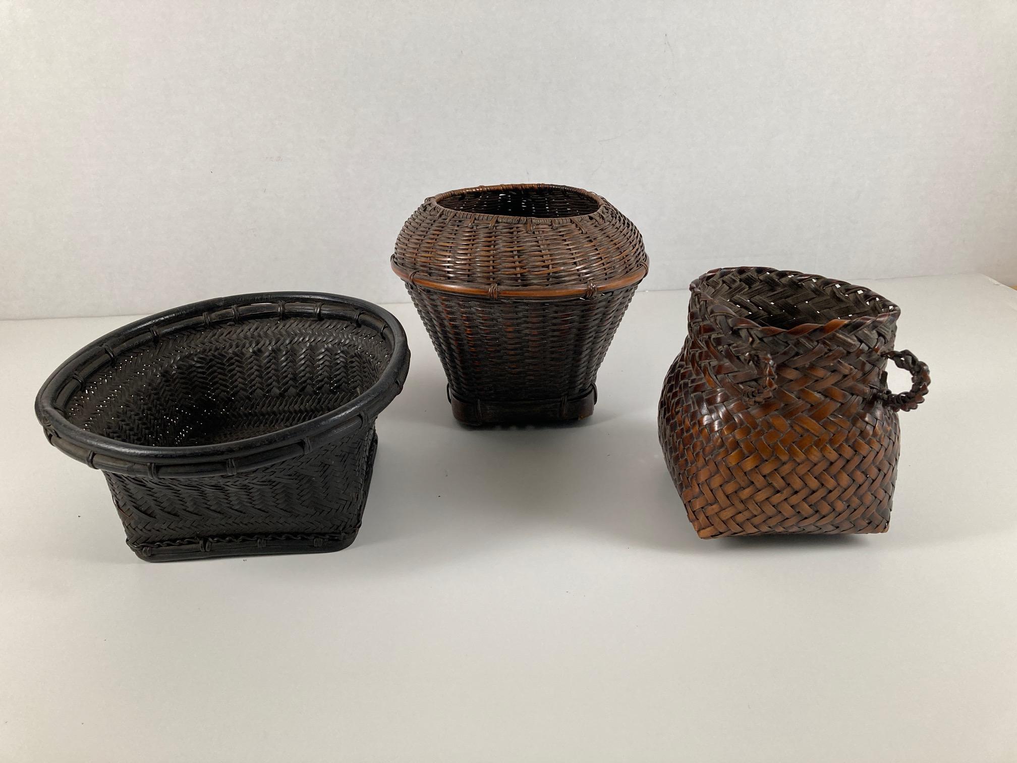 Set of 3 old Northern Philippines (Luzon area) storage and seed baskets. From the private collection of a retired ship's captain who traveled to the Philippines and collected native artifacts for over 40 years. Round tops and square bottoms. All in