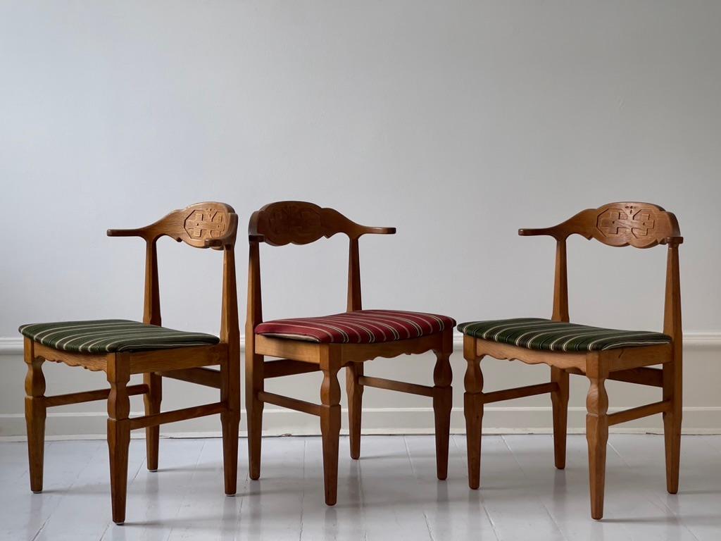 Set of 3 original danish mid century modern chairs by Henning Kjærnulf (also designer of Razor Blade chair ) for EG Møbler. Beautiful solid oak with elegant original upholstery retained, in good vintage condition.