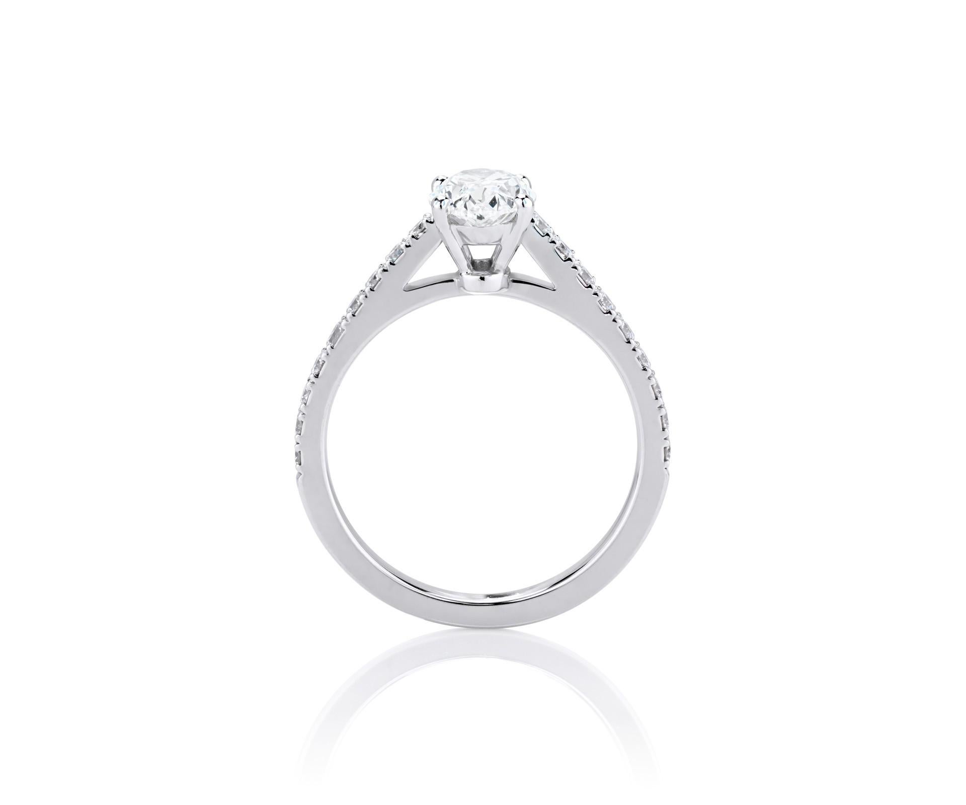 Center stone is 3 carat Oval cut GIA certified with the quality of H-I SI mounted in platinum 950. 