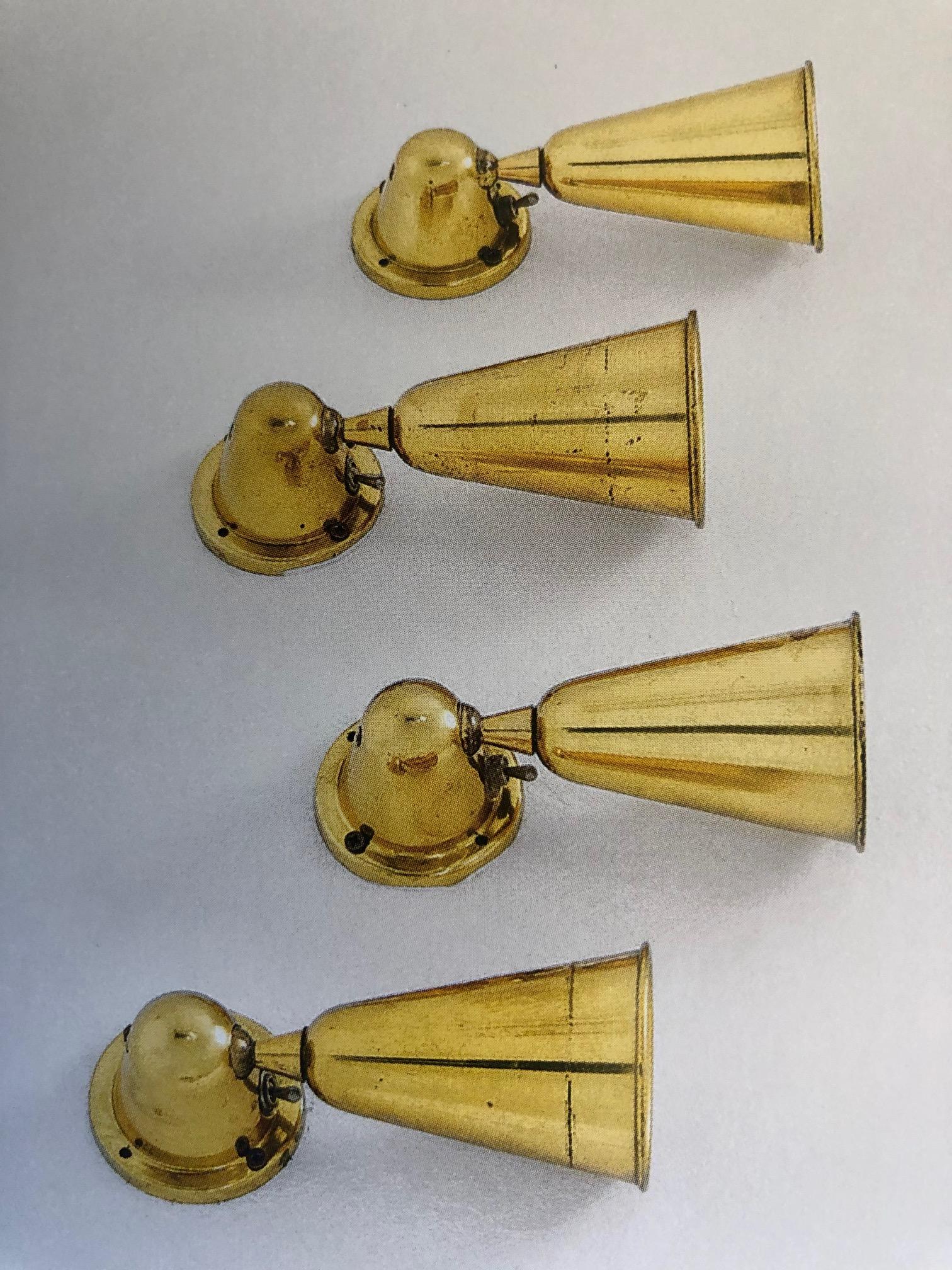 Three pairs of elegant Italian Mid-Century Modern solid brass wall lights in a cone form by Gustavo Pulitzer for Arredoluce. The lights are suitable for bedroom or even as flush mount ceiling fixtures. They will rotate/ articulate as needed.