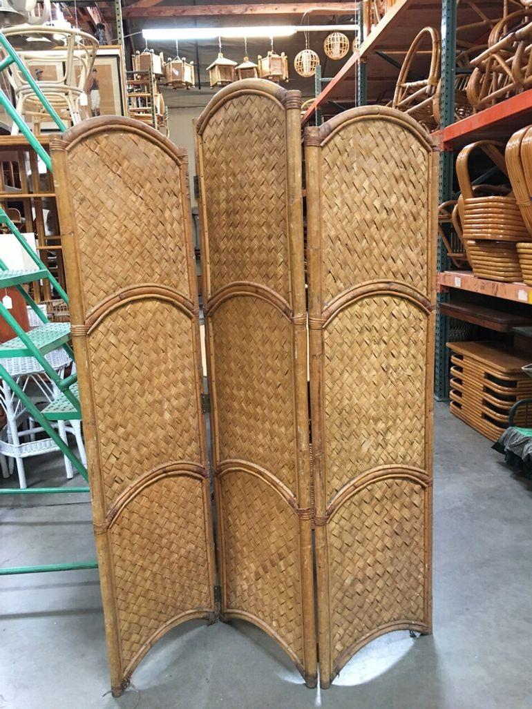 Original 1950 Woven Wicker room divider folding screen with an arched top. This rattan and woven wicker folding room divider screen was 3 panels each 65
