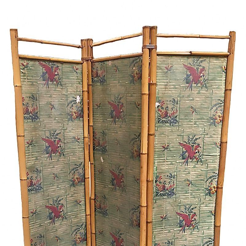 Original 1940 Bamboo room divider folding screen with a tropical parrot print on each panel. This bamboo folding room divider screen was 3 panels each 72