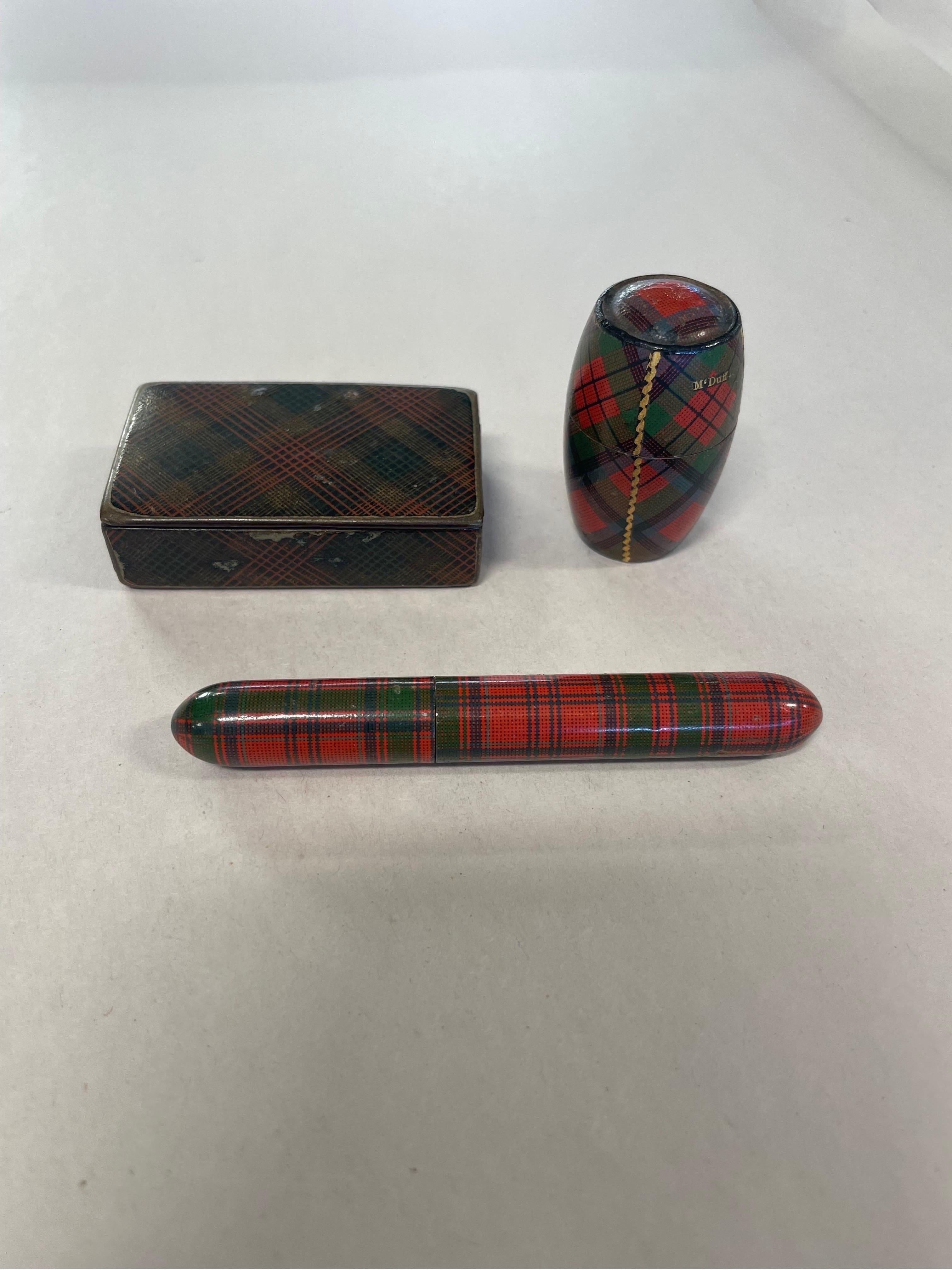 3 Pc, Antique Scottish Tartanware Sewing & Snuff box objects.


A grouping of 3 antique Scottish tartan ware objects including a thimble in its original holder, a two piece needle case and a small trinket or snuff box.


Some wear present to
