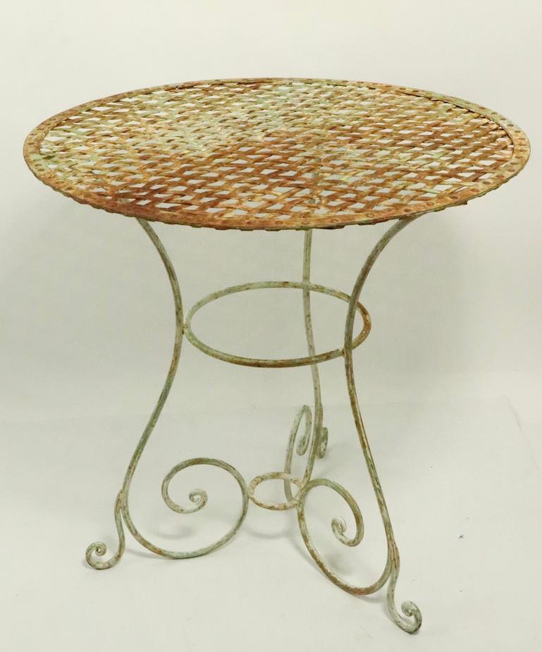 heavy wrought iron bistro set