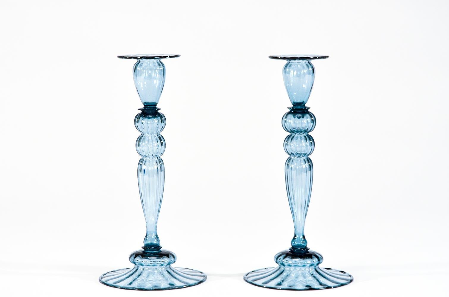 This impressive centerpiece set was made by Steuben and features the most unusual color I call 