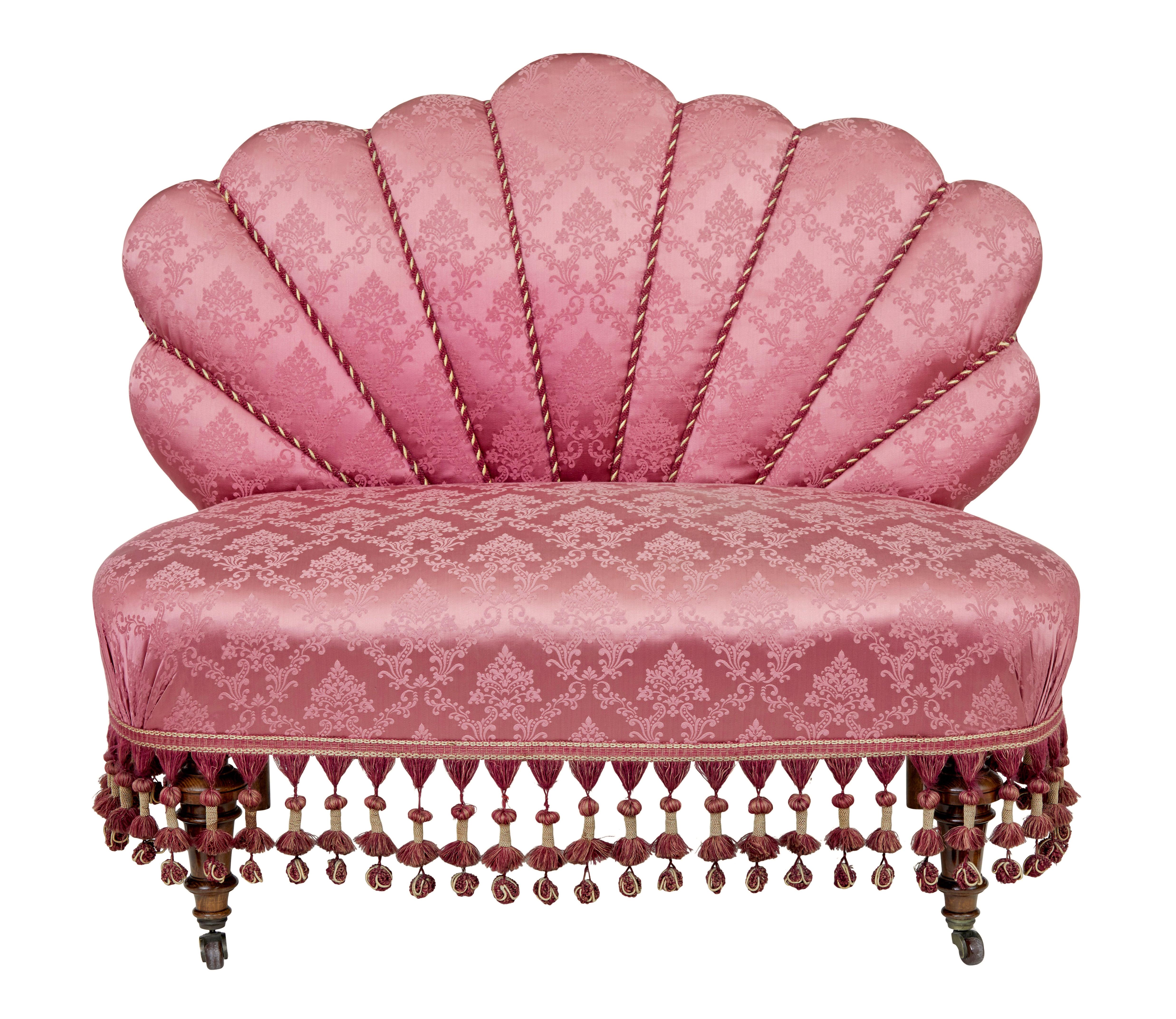 3 piece art deco shell back salon suite circa 1930.

Good quality suite comprising of a sofa and 2 matching chairs.  All with fanned shell backs decorated with piping, shaped seats.  Mahogany front turned legs with brass castor.

Upholstery is in