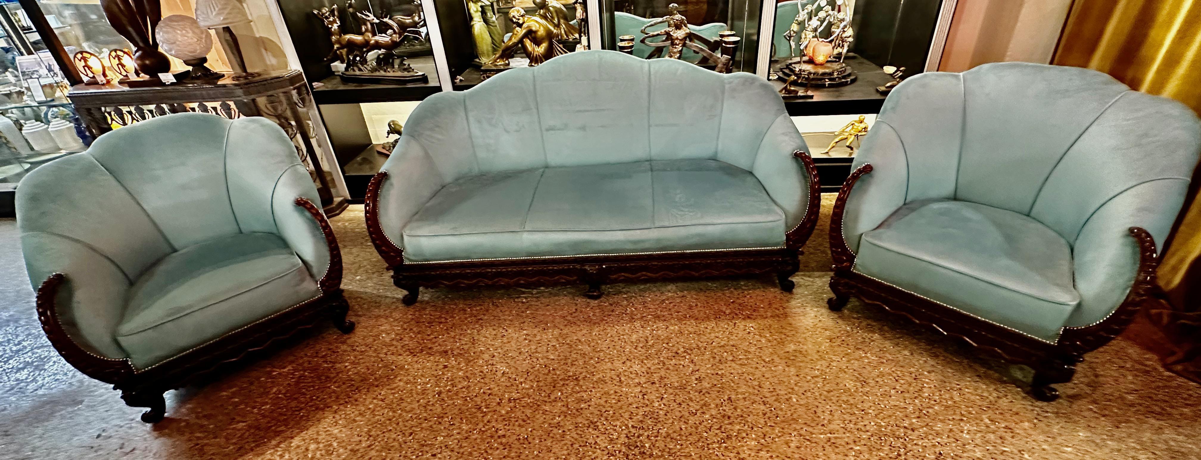 3 Piece Art Deco Sofa Carved Frame. This exquisite Art Deco sofa set showcases a masterful blend of intricate carving and upholstered cloud-like shapes, making it an extraordinary focal point for any sophisticated living space. The frame of each