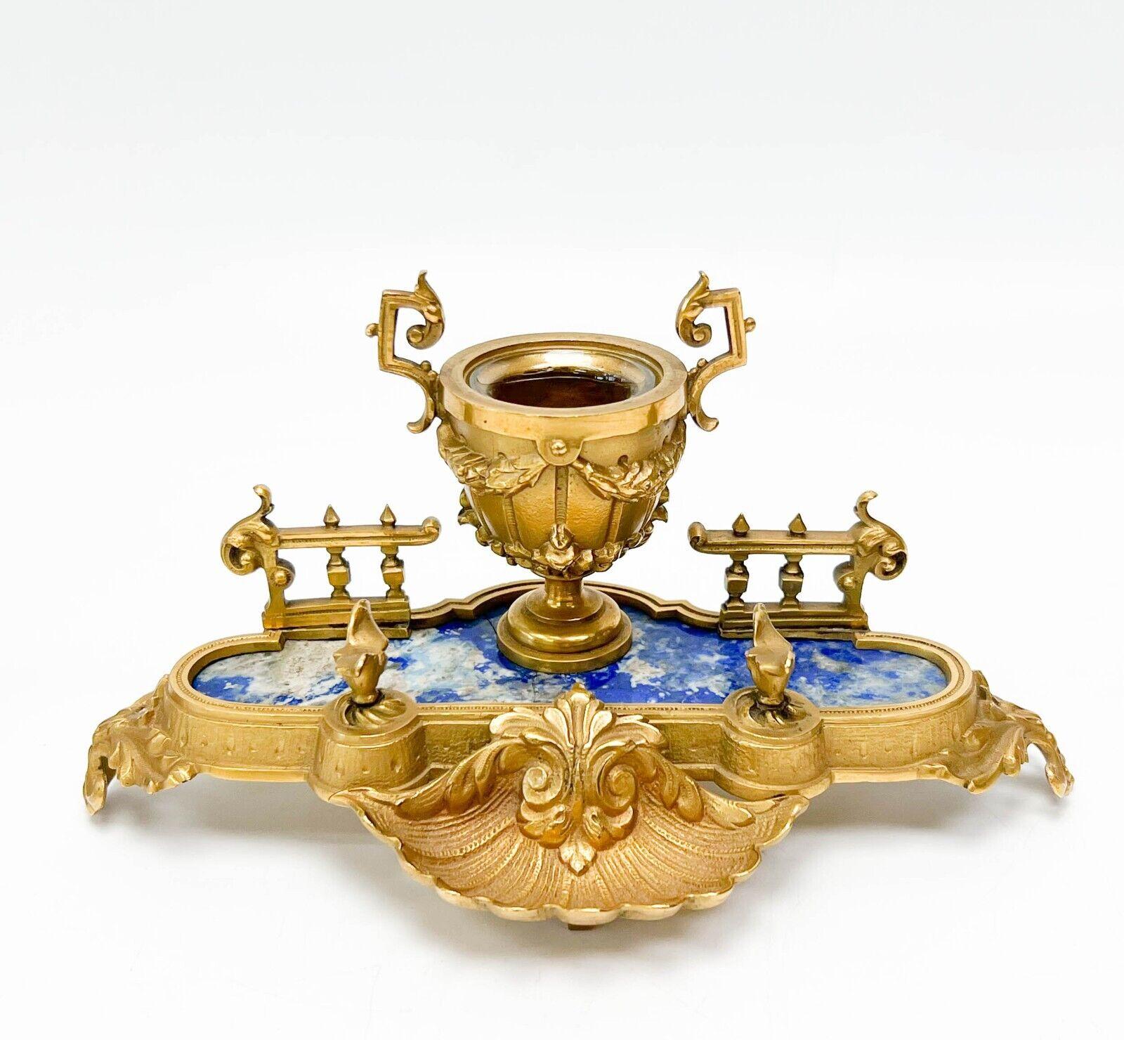  3 piece Continental desk garniture gilt bronze & lapis lazuli, possibly French, circa 1920. Main piece with inkwell with glass liner, pair chamber sticks. Gilt bronze mounts with foliate and shell decoration. Ink stand with inkwell, pen holder, nib