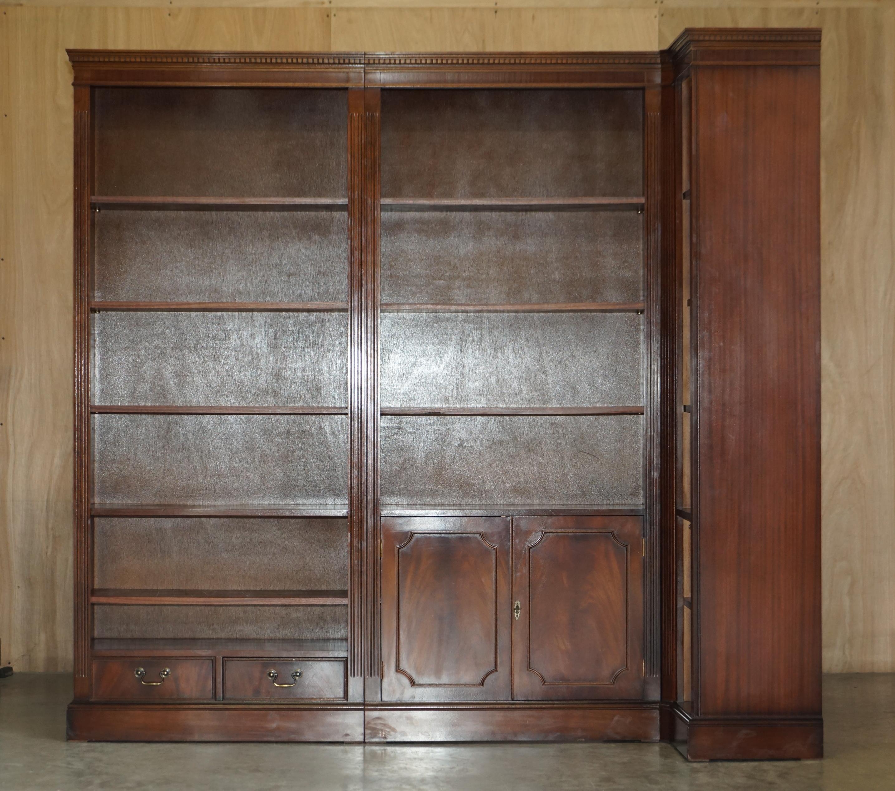 We are delighted to offer for sale this lovely vintage flamed mahogany and hardwood open corner library bookcase which splits into three easy to transport sections 

I have two of these bookcases, this one has three sections, the other which is